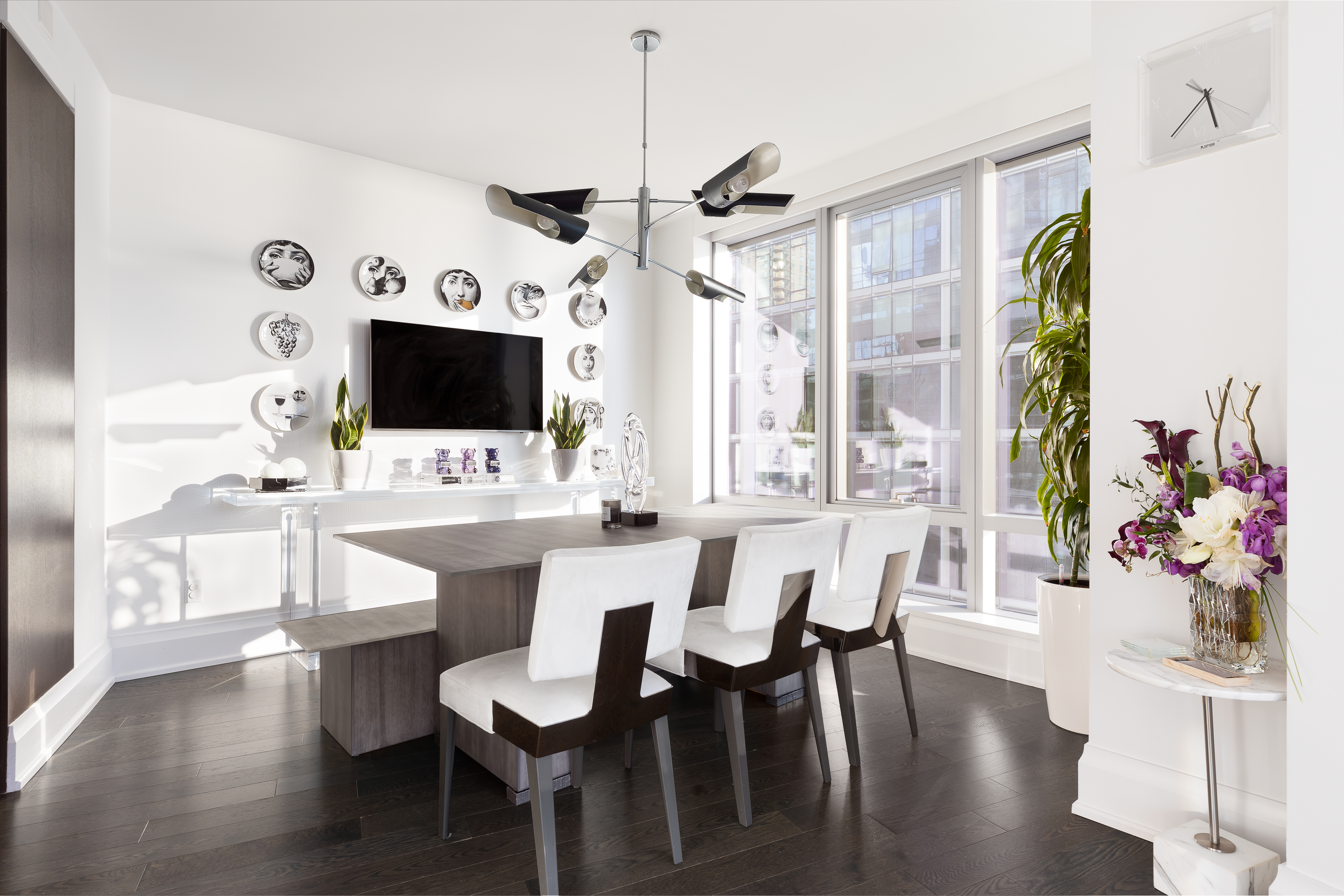 50 Riverside Boulevard, Unit 14L Manhattan, NY 10069 - Photo 10 of 21 a view of a dining room with furniture and wooden floor
