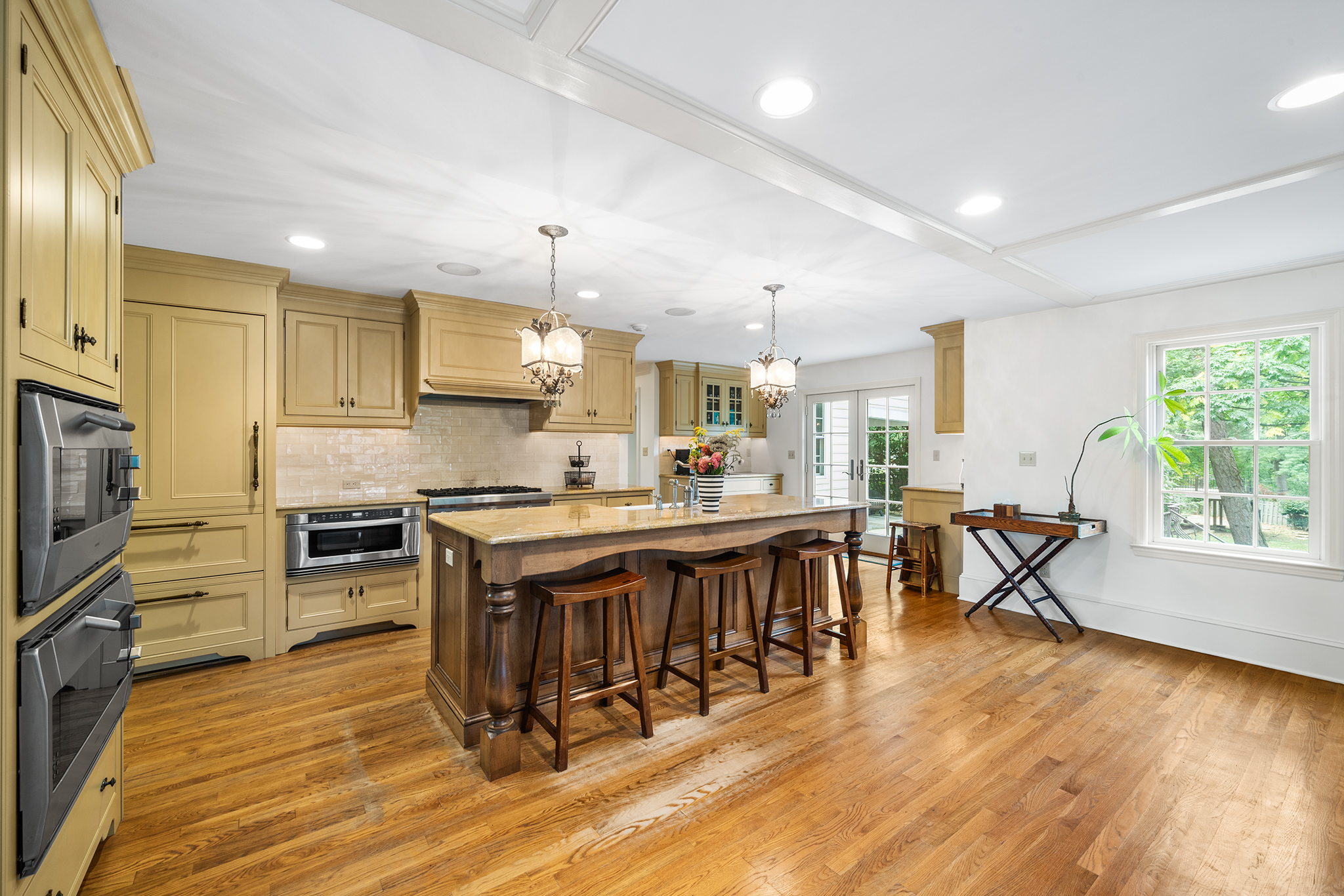718 Arlington Road Narberth, PA 19072 - Photo 8 of 47 a large kitchen with lots of counter space a sink appliances and dining table