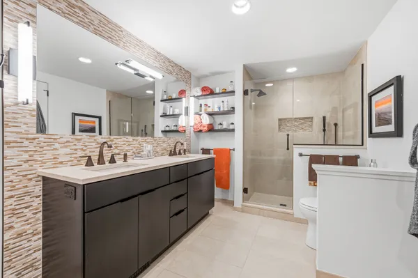 a kitchen with a sink stove and refrigerator