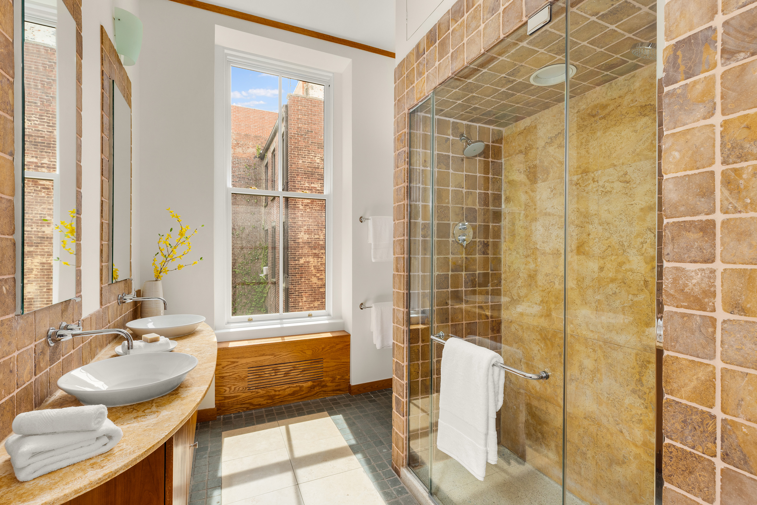 75 Columbia Heights Brooklyn, NY 11201 - Photo 9 of 23 a bathroom with a tub sink and window