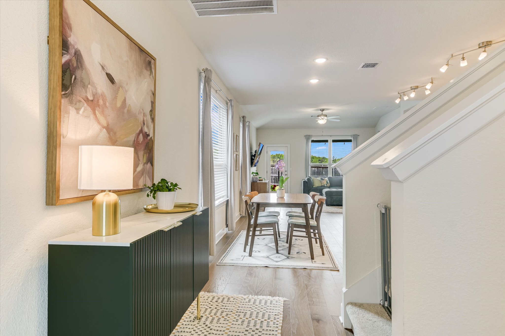 8607 McKamy Drive Austin, TX 78744 - Photo 11 of 28 a living room with furniture and a table