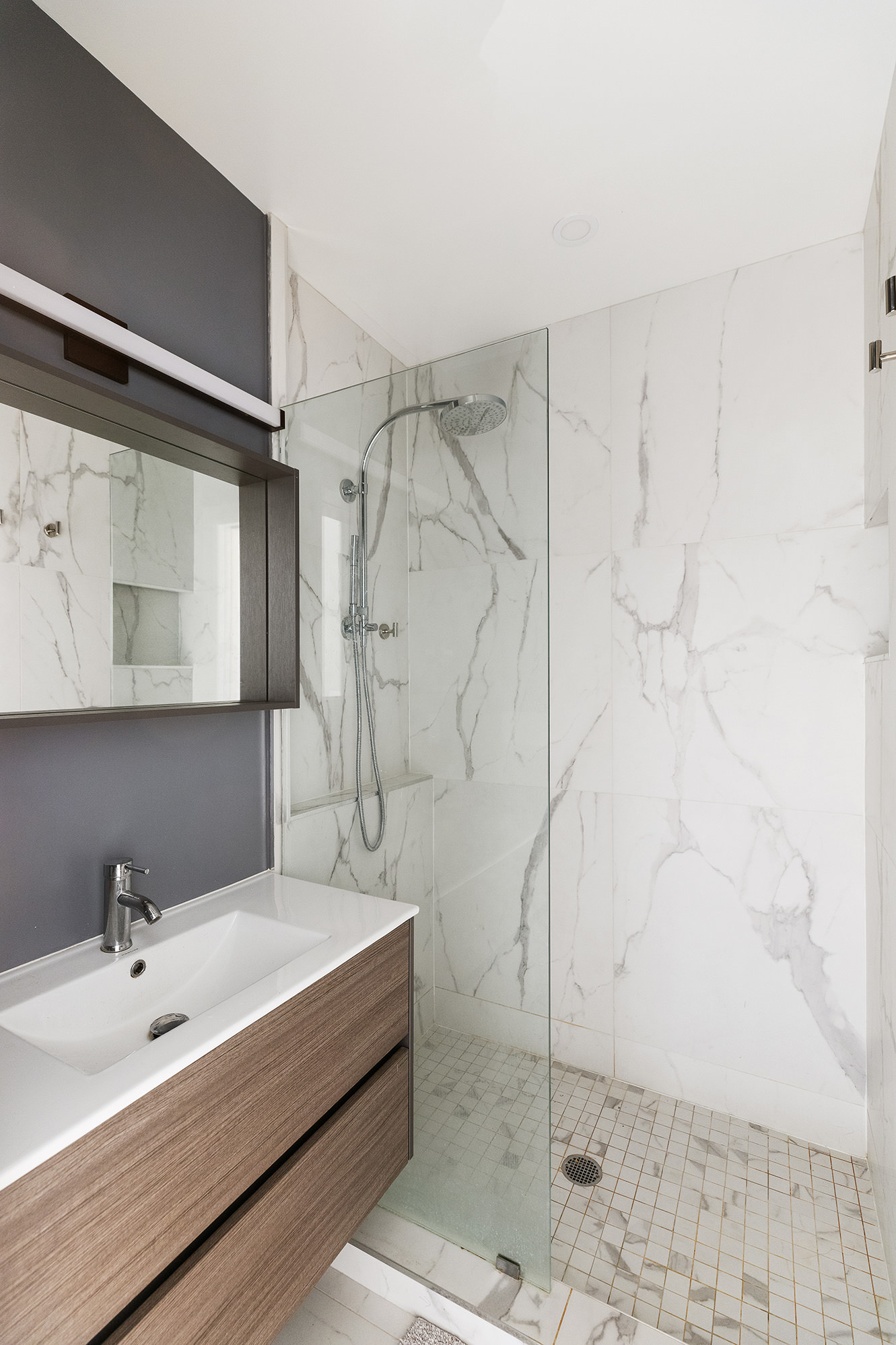 330 East 94th Street, Unit 1AB Manhattan, NY 10128 - Photo 6 of 14 a bathroom with a bathtub and a shower