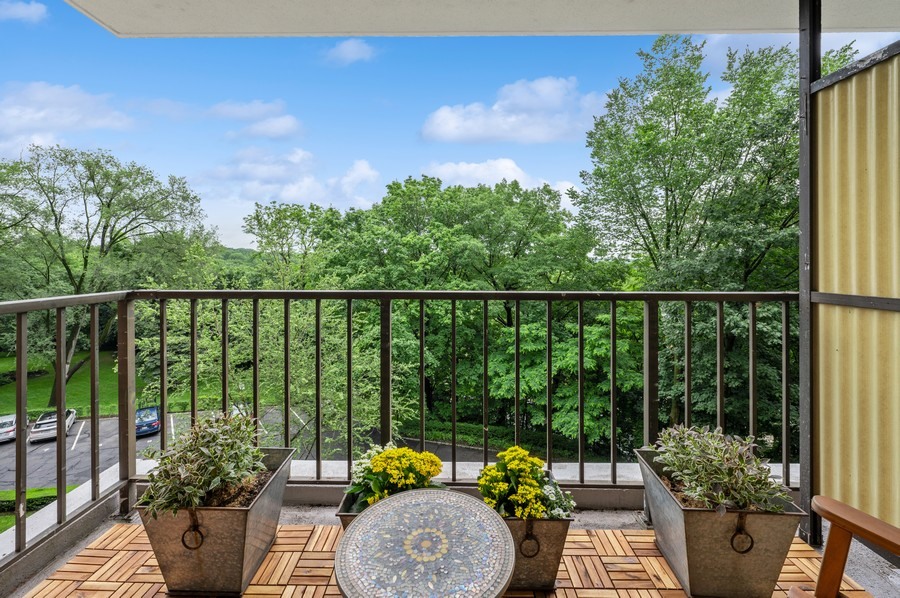 4525 Henry Hudson Parkway West, Unit 506 Bronx, NY 10471 - Photo 11 of 12 a view of a balcony with chairs potted plants
