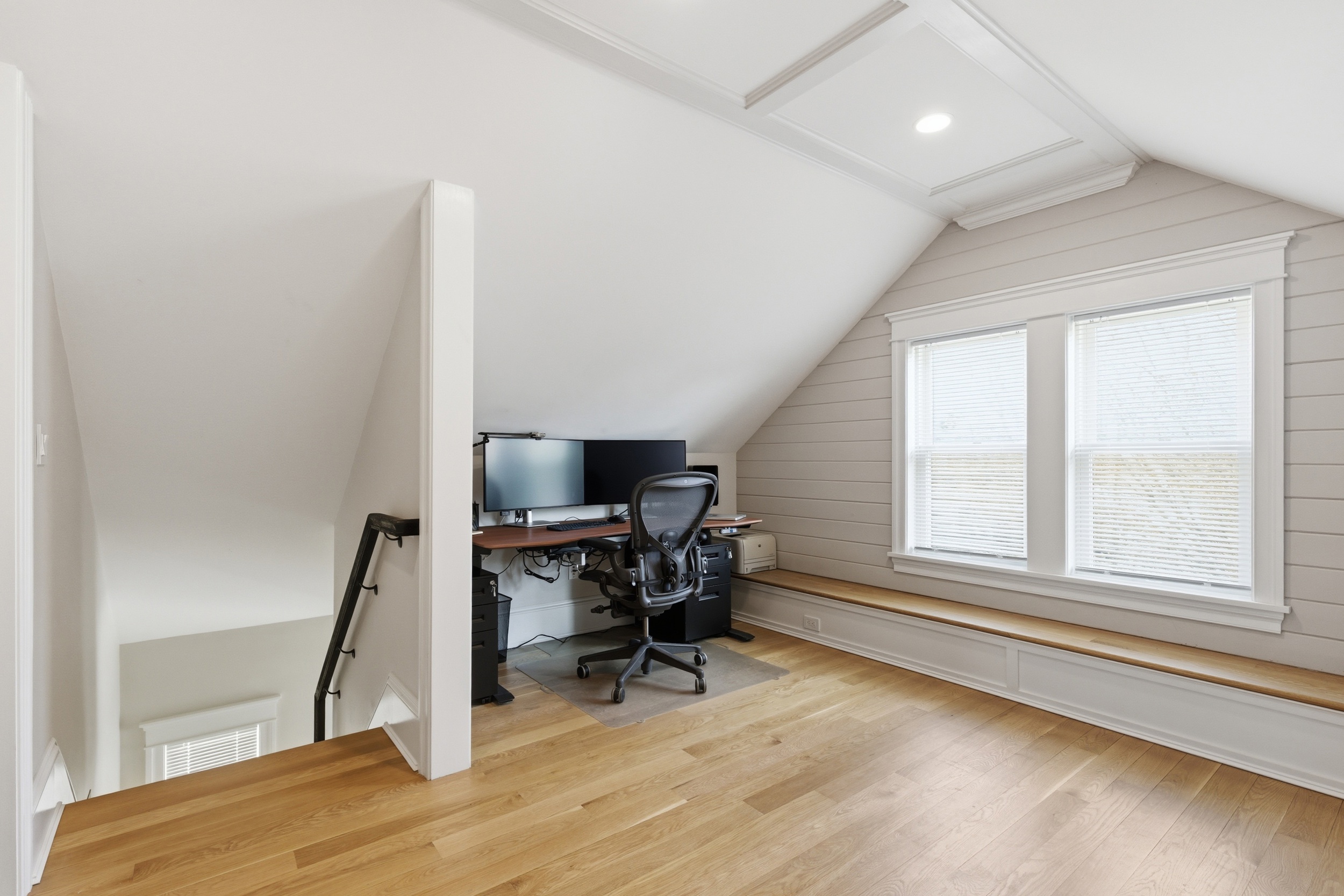 48-50 Amsden Street, Unit 2 Arlington, MA 02474 - Photo 23 of 34 a view of a workspace with furniture and a window