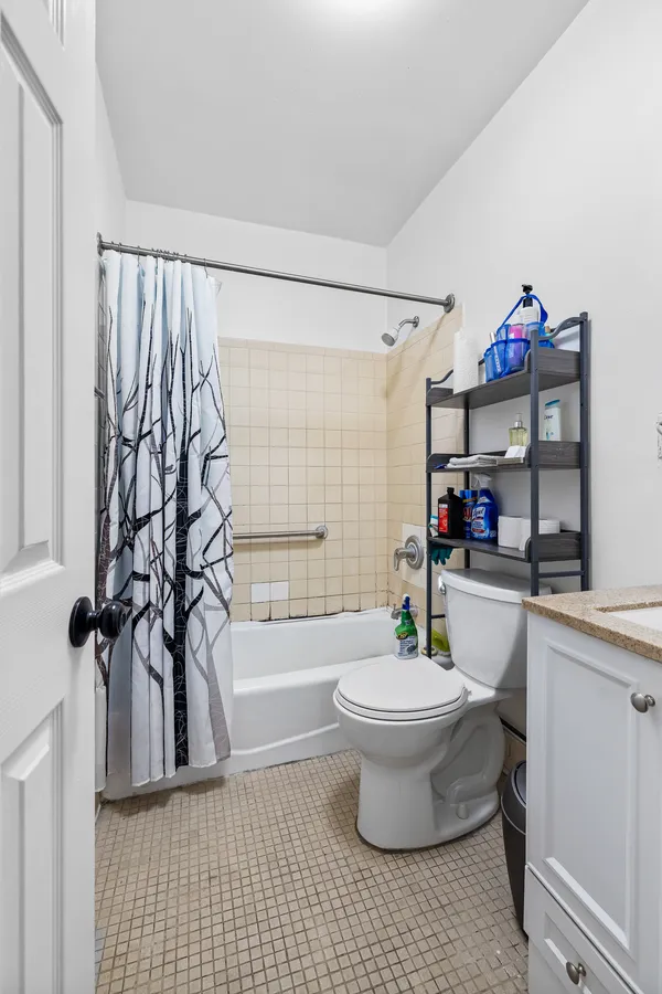 a bathroom with a toilet a sink and a bathtub