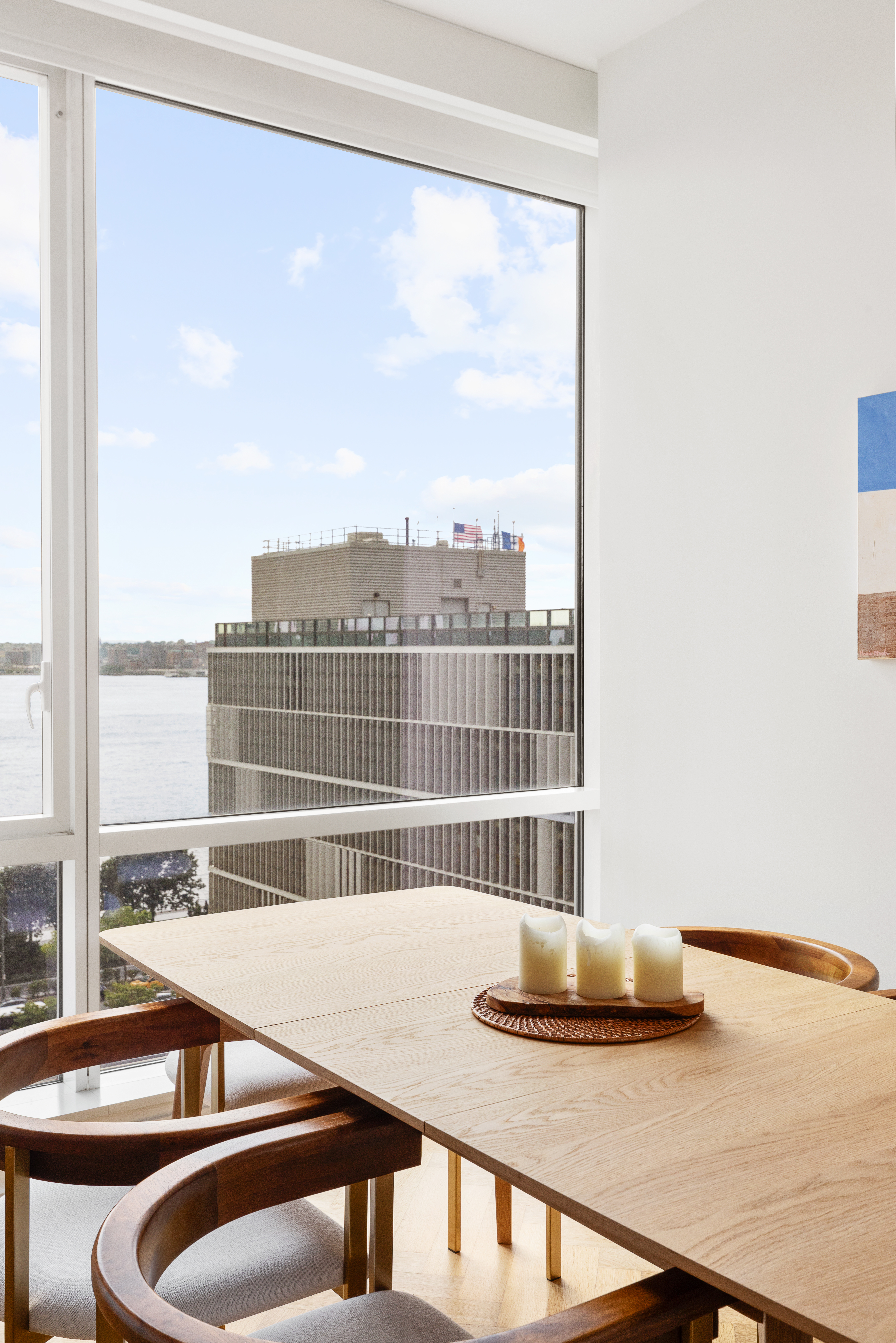 330 Spring Street, Unit 11B Manhattan, NY 10013 - Photo 5 of 10 a room with furniture and a window