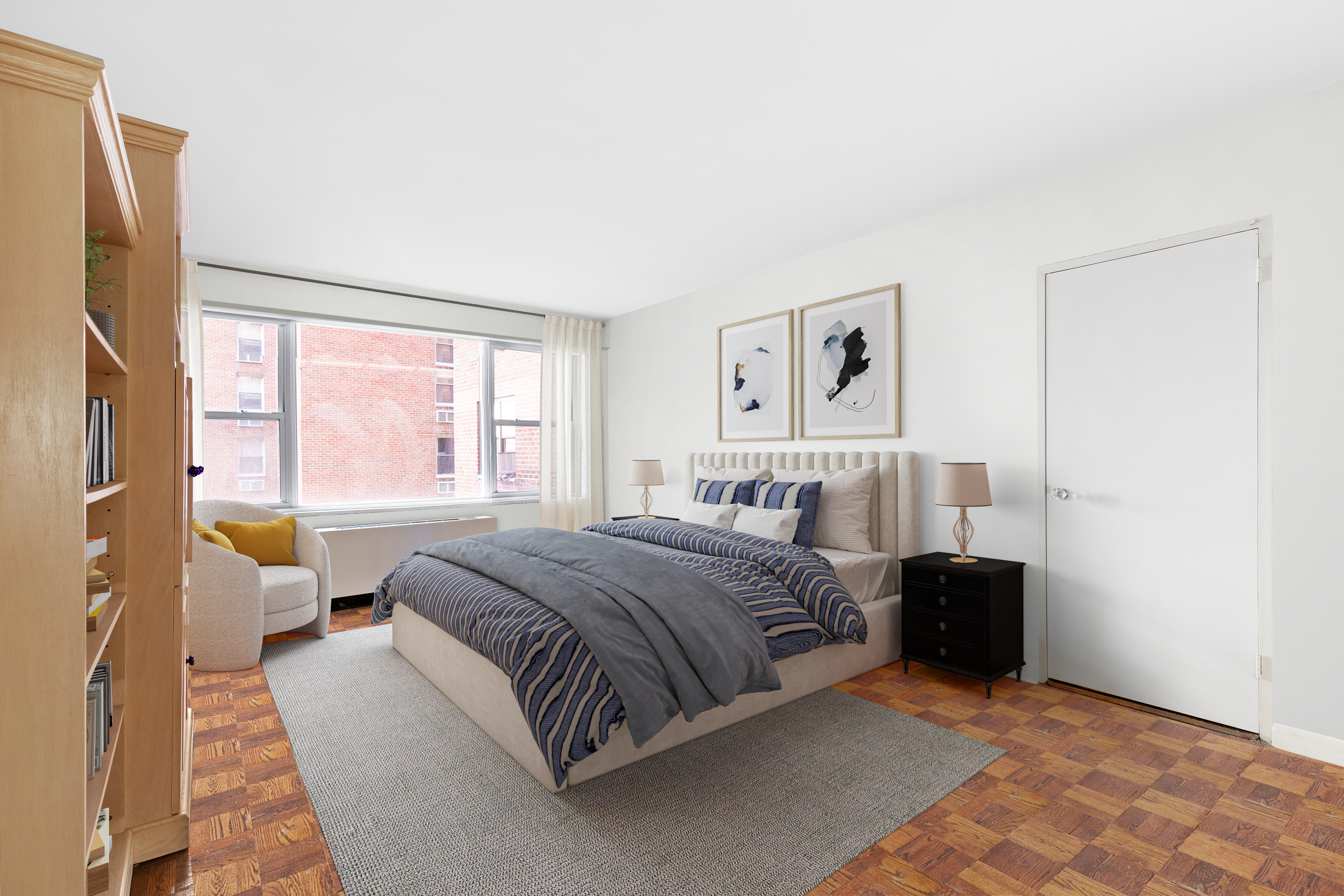 50 Sutton Place South, Unit 7A Manhattan, NY 10022 - Photo 12 of 16 a bedroom with a bed couch and a window