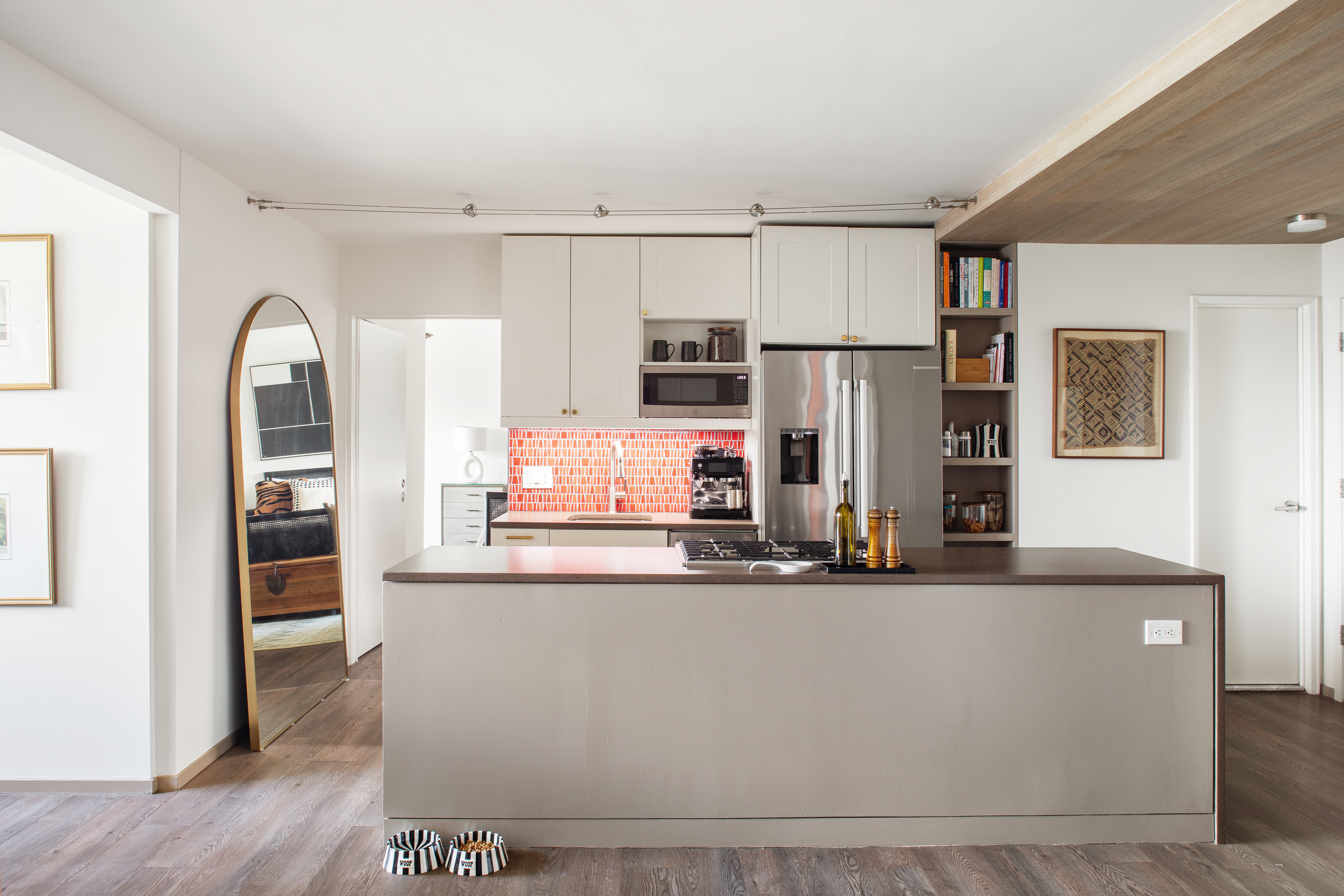 69 West 9th Street, Unit 11CDE Manhattan, NY 10011 - Photo 3 of 9 a kitchen with stainless steel appliances granite countertop a refrigerator and a stove top oven