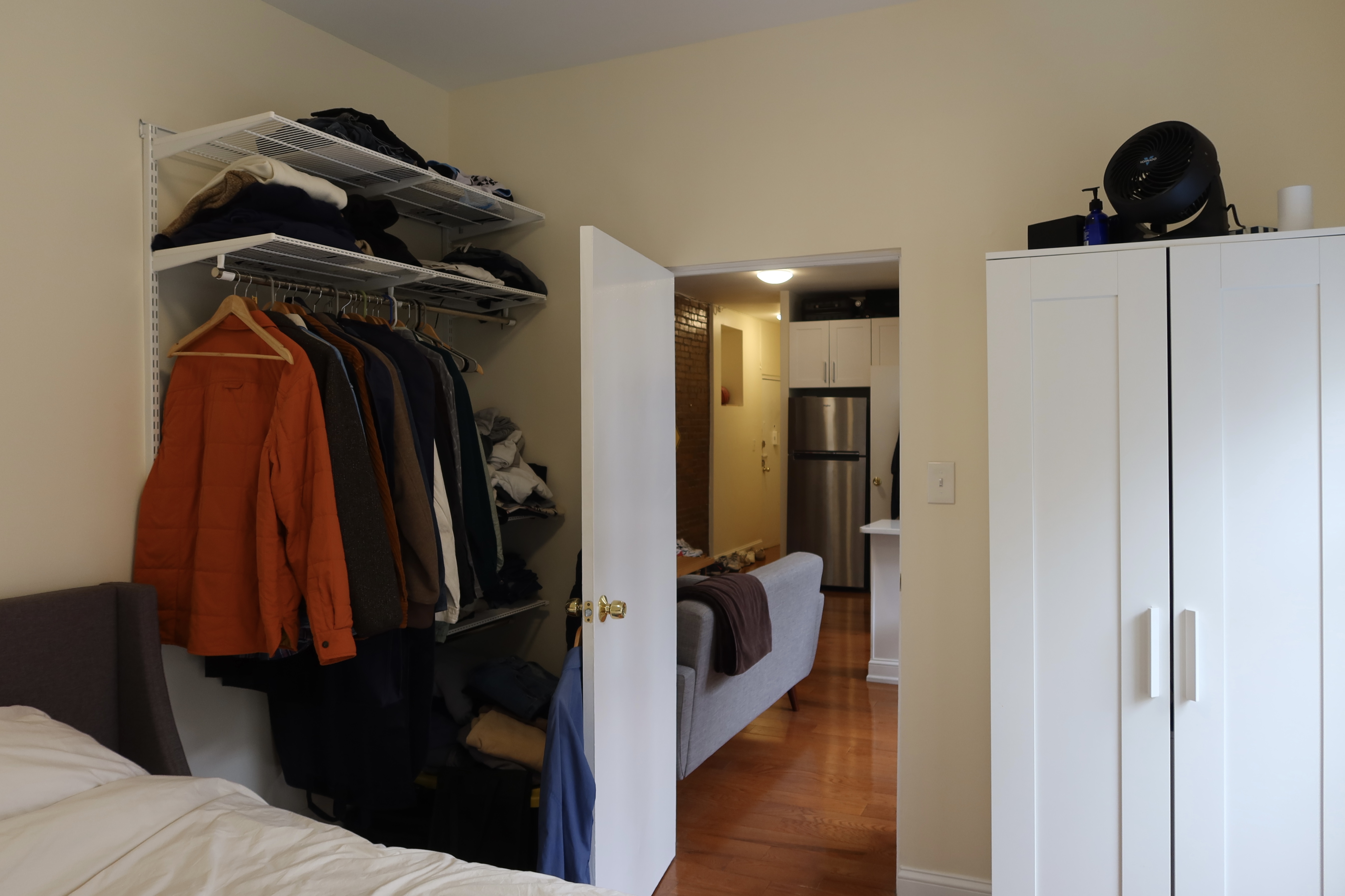 56 Stagg Street, Unit 4 Brooklyn, NY 11206 - Photo 6 of 11 a view of walk in closet with clothes and shoes