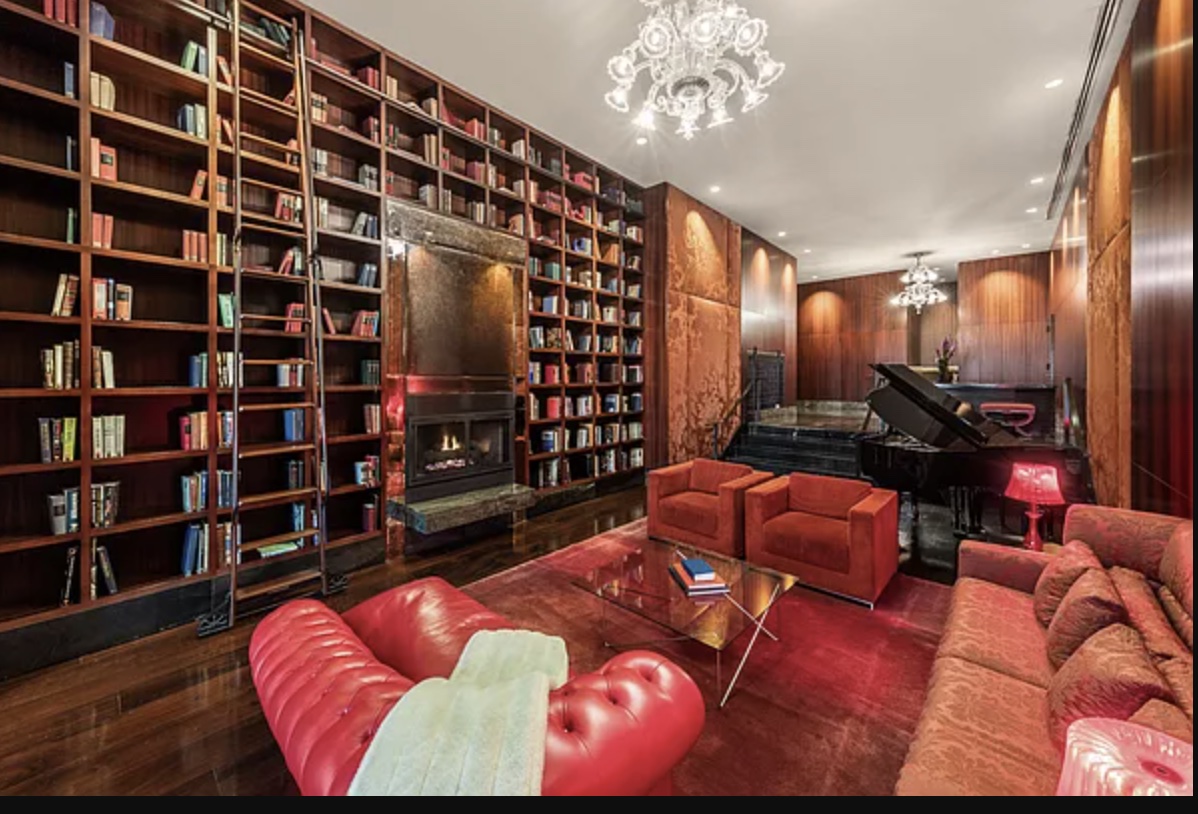 88 Greenwich Street, Unit 501 Manhattan, NY 10006 - Photo 10 of 15 a view of walk in closet with clothes and shoes