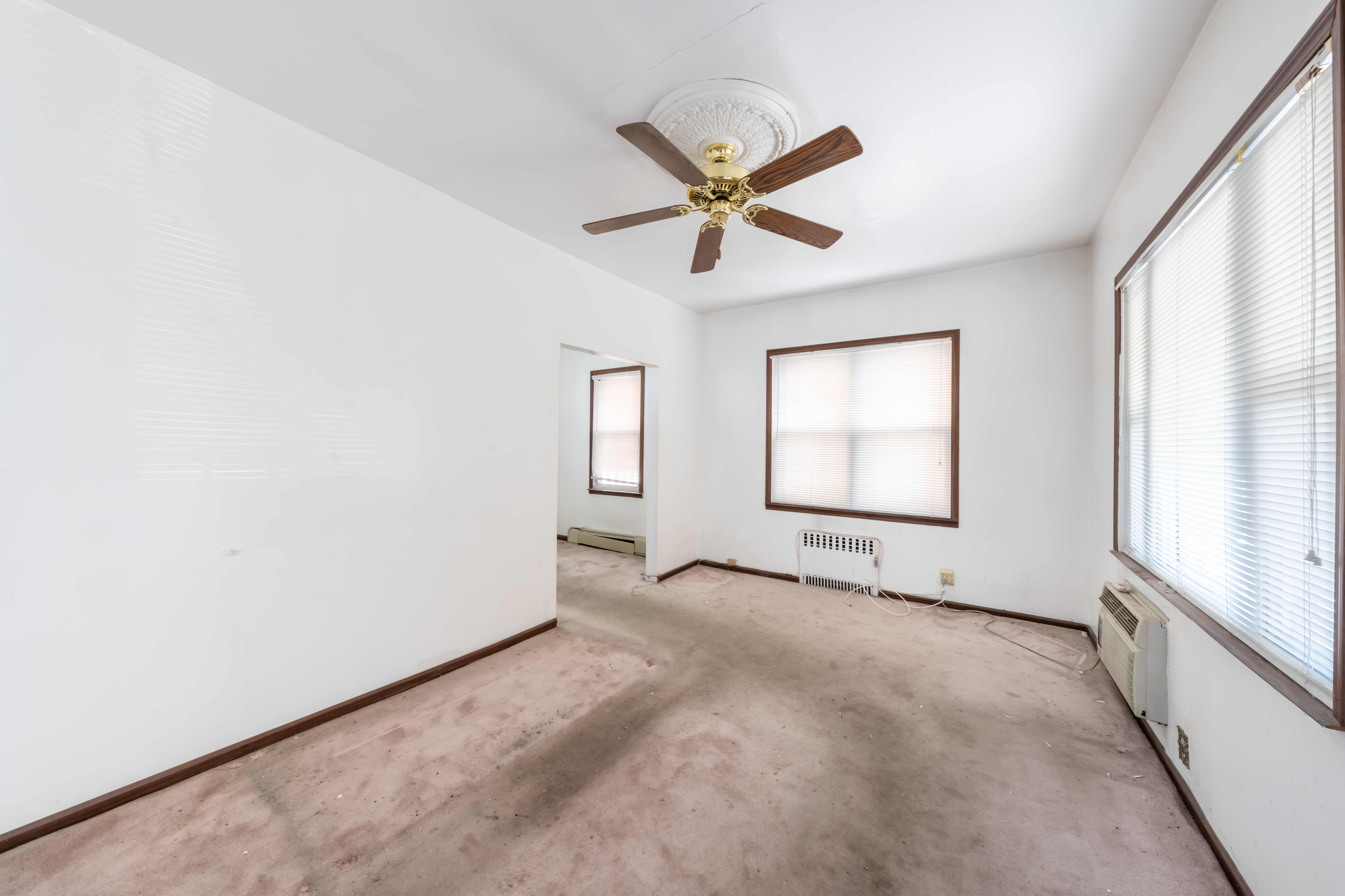1085 Arnow Avenue Bronx, NY 10469 - Photo 6 of 16 a view of an empty room with a window