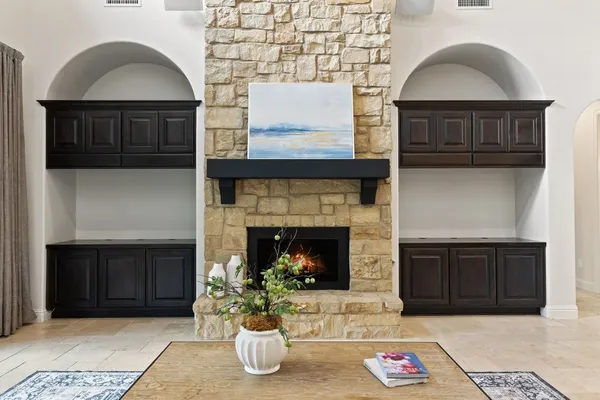 a kitchen with a sink stove and cabinets