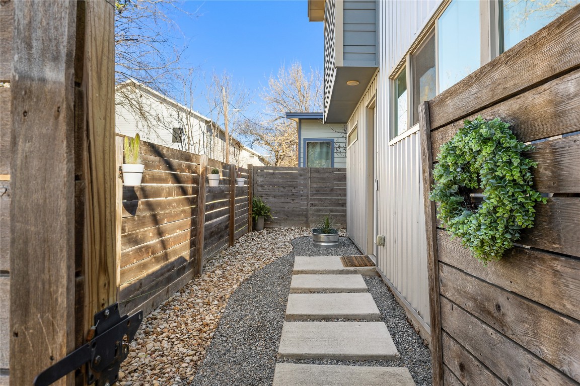 1402 Singleton Avenue, Unit B Austin, TX 78702 - Photo 2 of 26 a view of a pathway of a house
