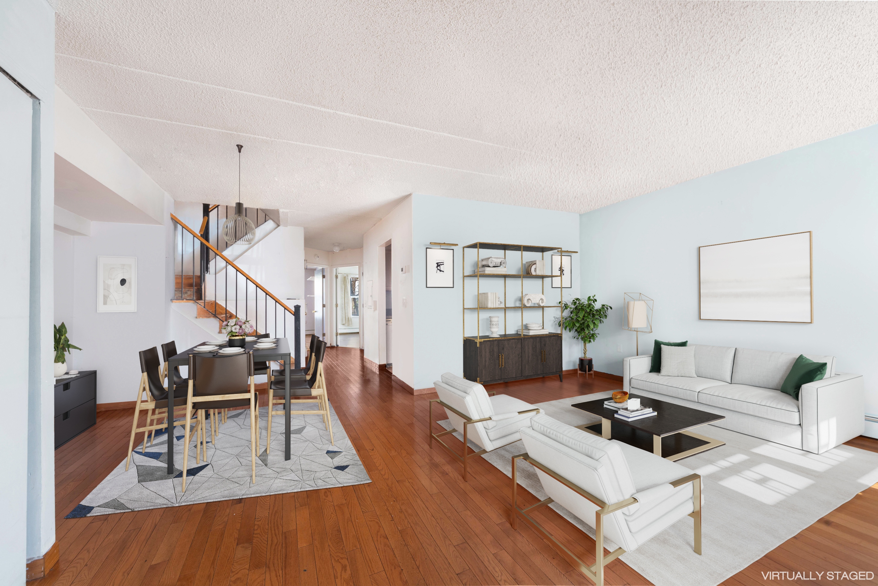 125 West 117th Street Manhattan, NY 10026 - Photo 3 of 23 a living room with furniture and a wooden floor