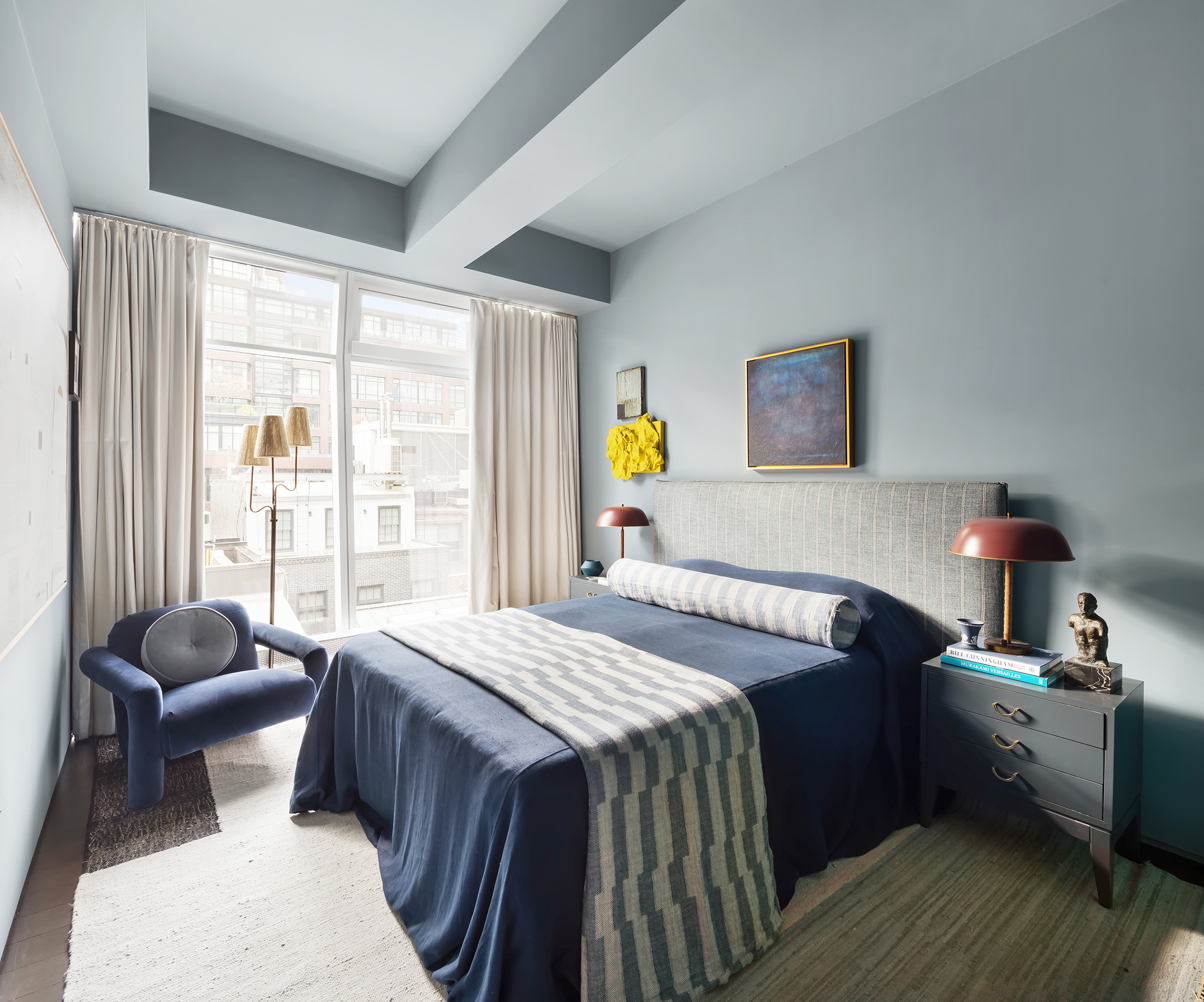 166 Perry Street, Unit 4B Manhattan, NY 10014 - Photo 7 of 14 a bedroom with a bed and a window