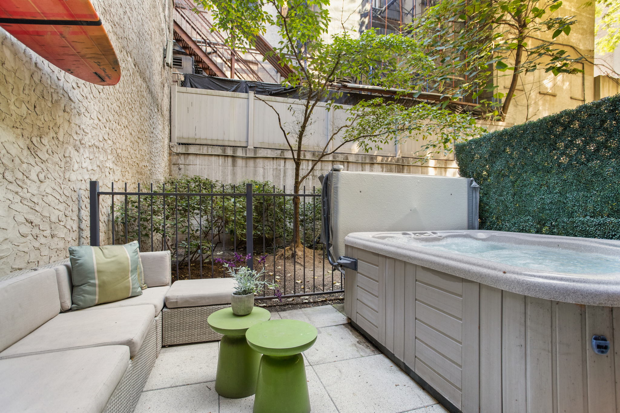350 West 53rd Street, Unit THG Manhattan, NY 10019 - Photo 18 of 25 a view of a patio with couches table and chairs and potted plants