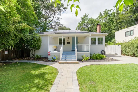 front view of a house with a yard