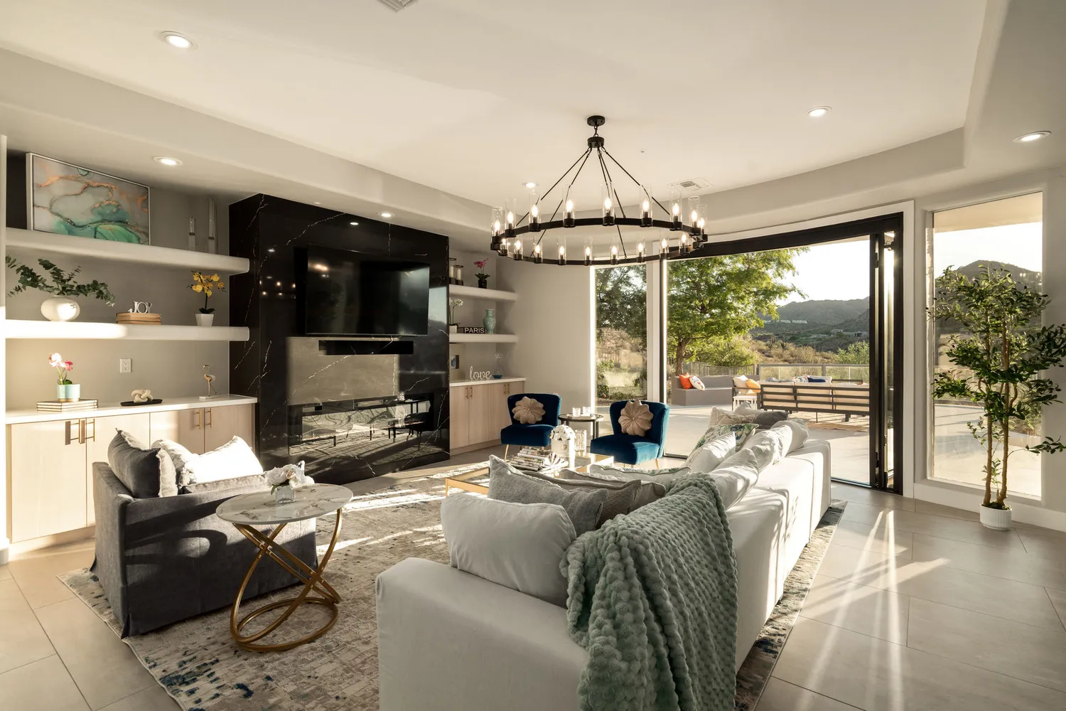 a living room with furniture and a large window