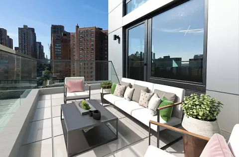 a building outdoor space with patio furniture