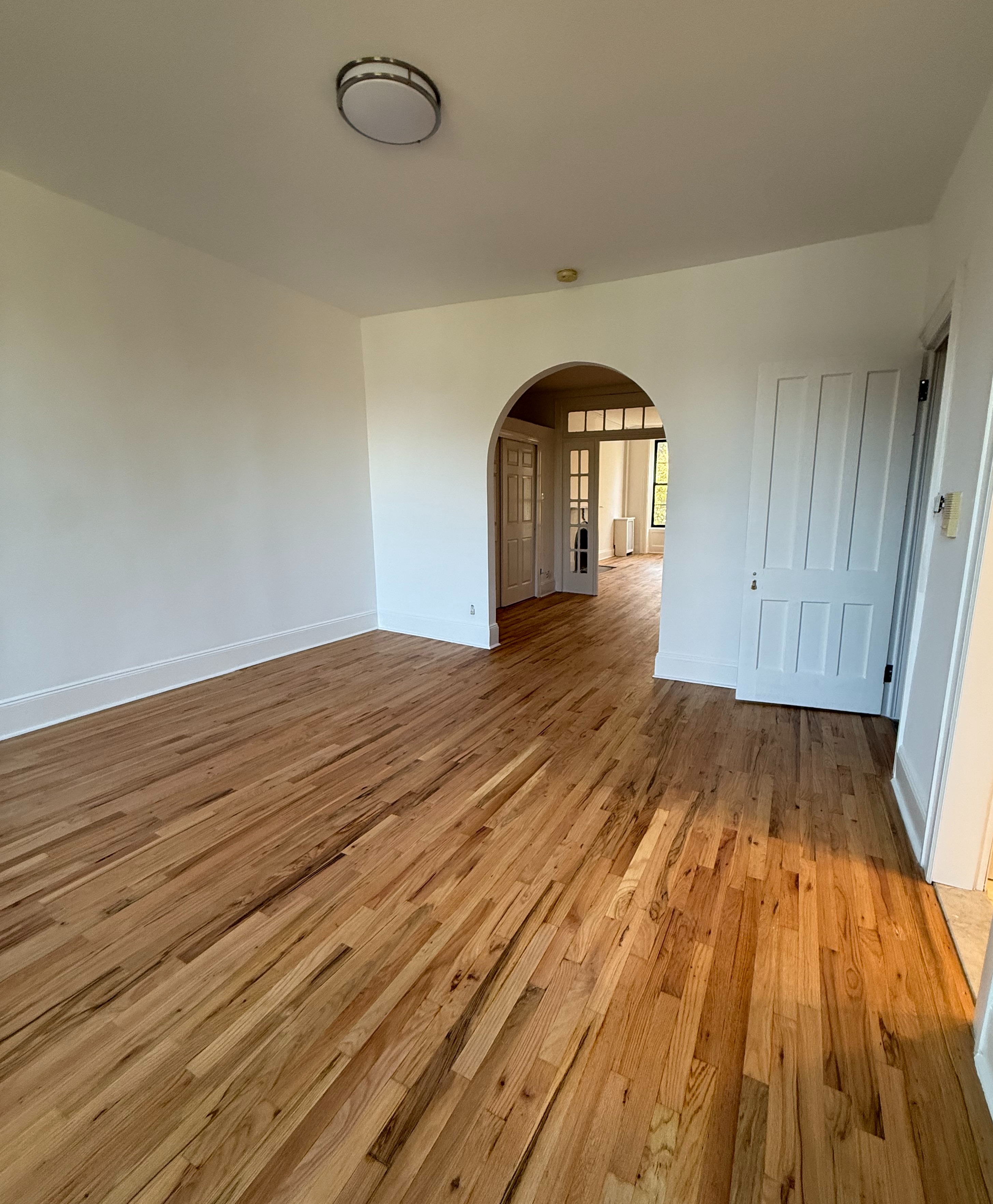 141 Summit Street, Unit 3 Brooklyn, NY 11231 - Photo 3 of 17 a view of empty room with wooden floor
