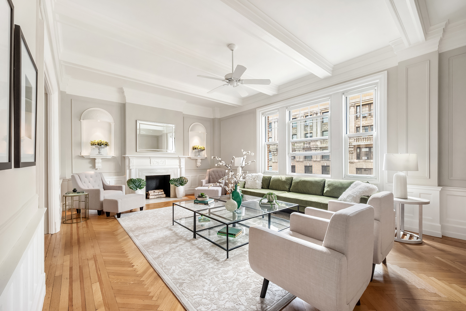 530 West End Avenue, Unit 9B Manhattan, NY 10024 - Photo 1 of 11 a living room with fireplace furniture and a large window