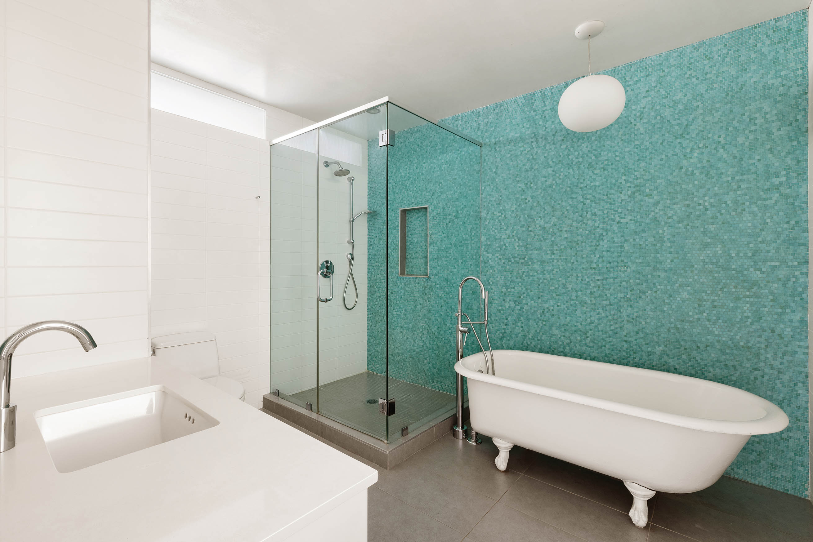 45 Lispenard Street, Unit 3E Manhattan, NY 10013 - Photo 7 of 13 a bathroom with a sink a toilet and shower