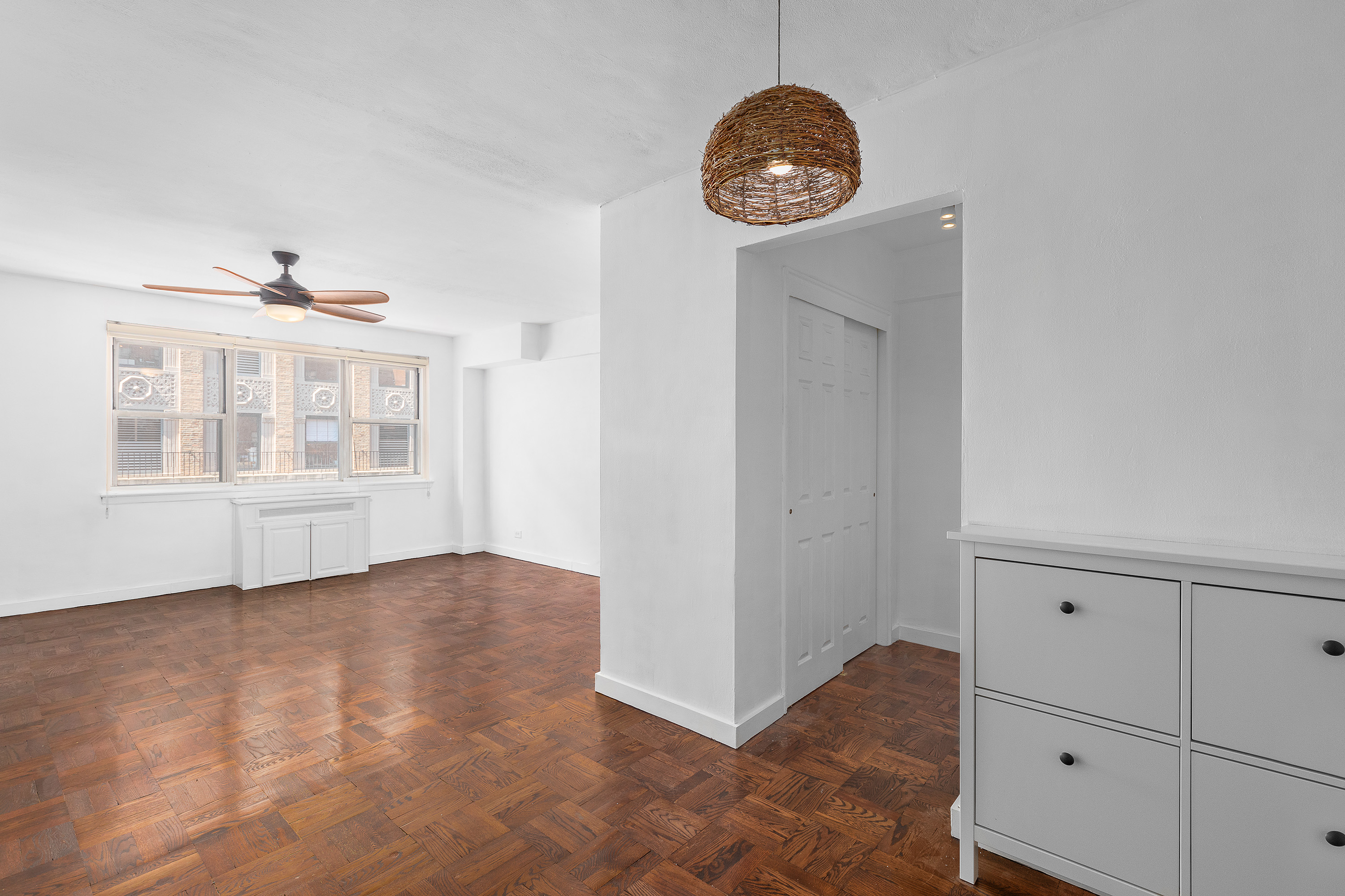139 East 33rd Street, Unit 15G Manhattan, NY 10016 - Photo 6 of 11 an empty room with windows