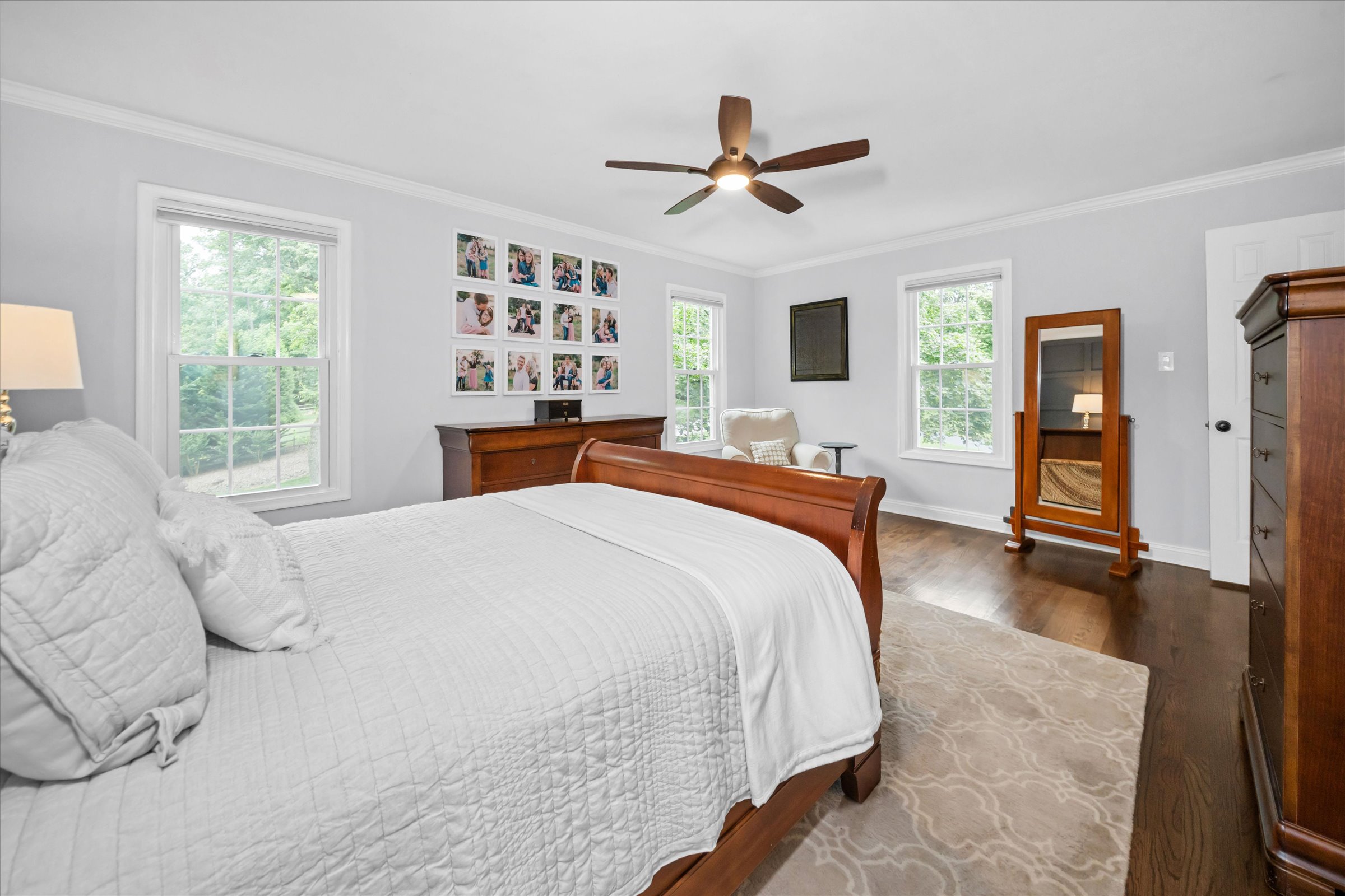 Address Upon Request West Chester, PA 19382 - Photo 33 of 76 a bedroom with a large bed and a chandelier