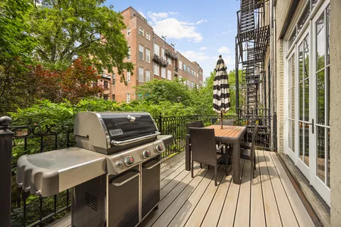 a view of a patio on wooden deck