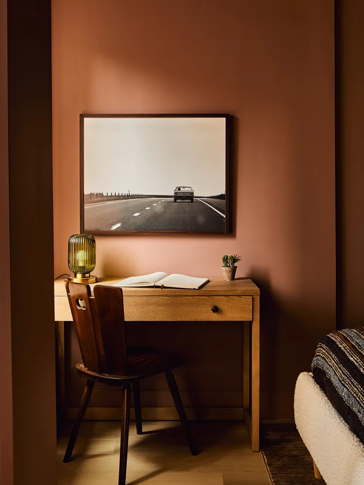 a view of a workspace with furniture