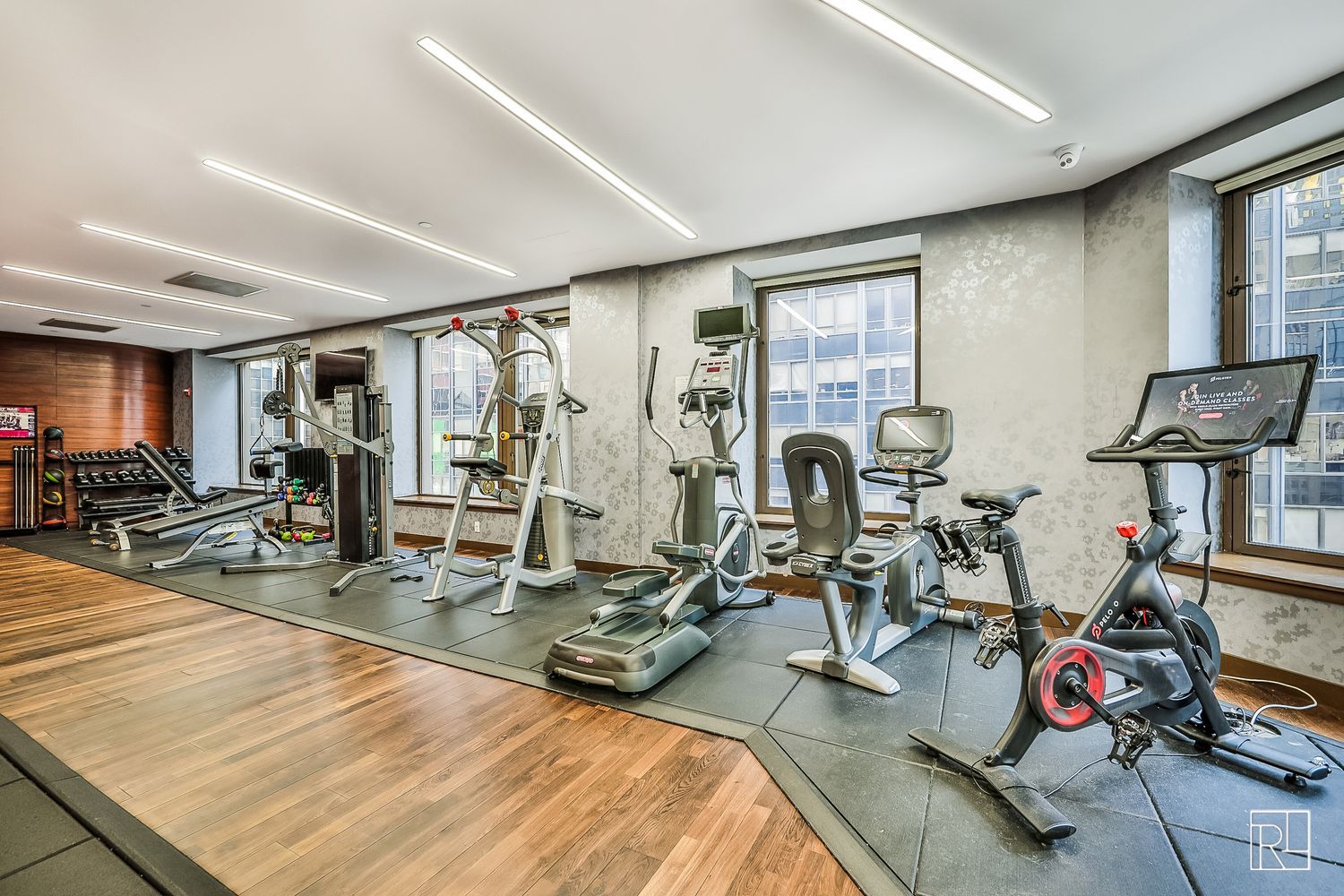 75 Wall Street, Unit 28D Manhattan, NY 10005 - Photo 19 of 35 a view of a room with gym equipment