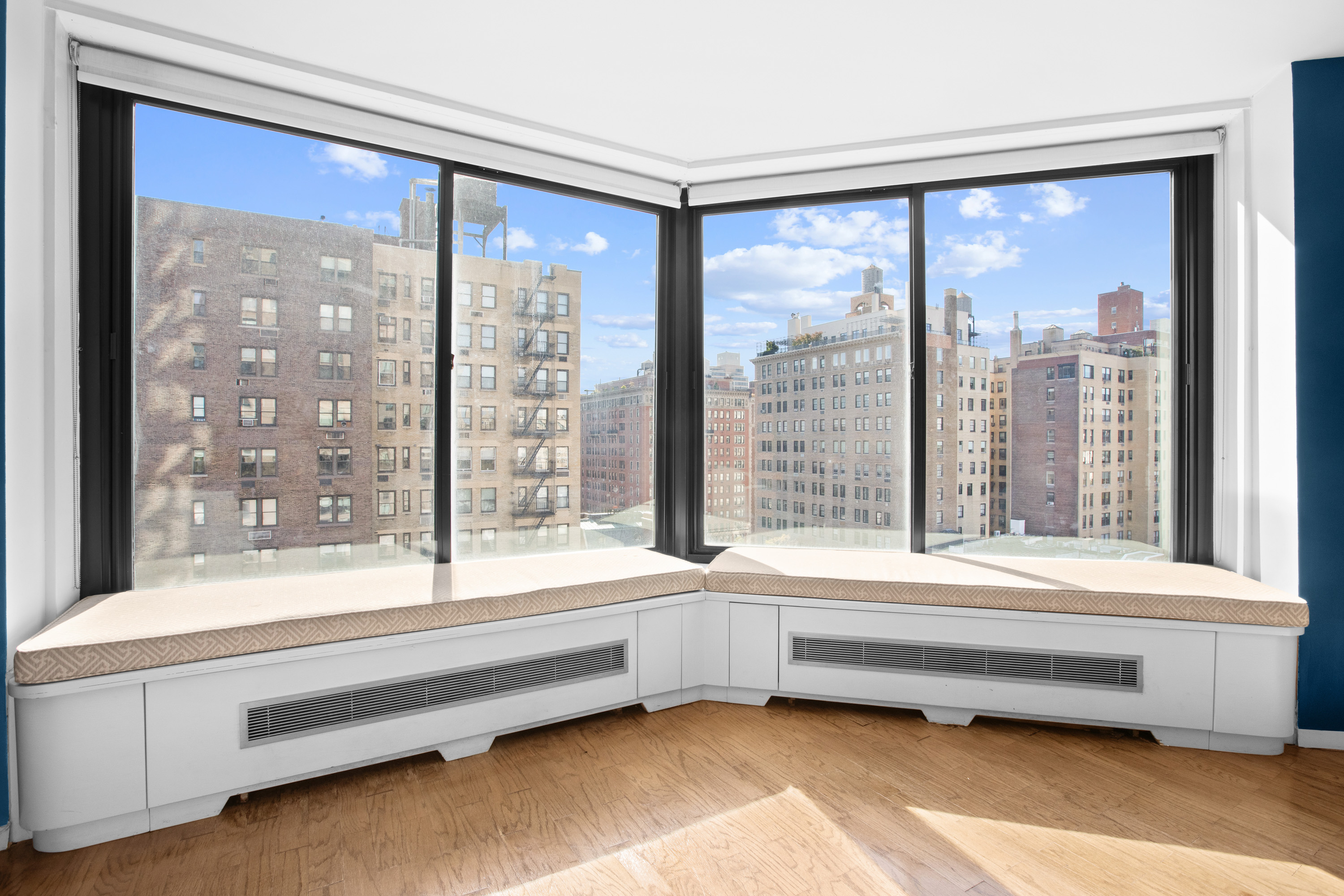 40 East 94th Street, Unit 13G Manhattan, NY 10128 - Photo 2 of 13 a bathroom with a bathtub and a large window