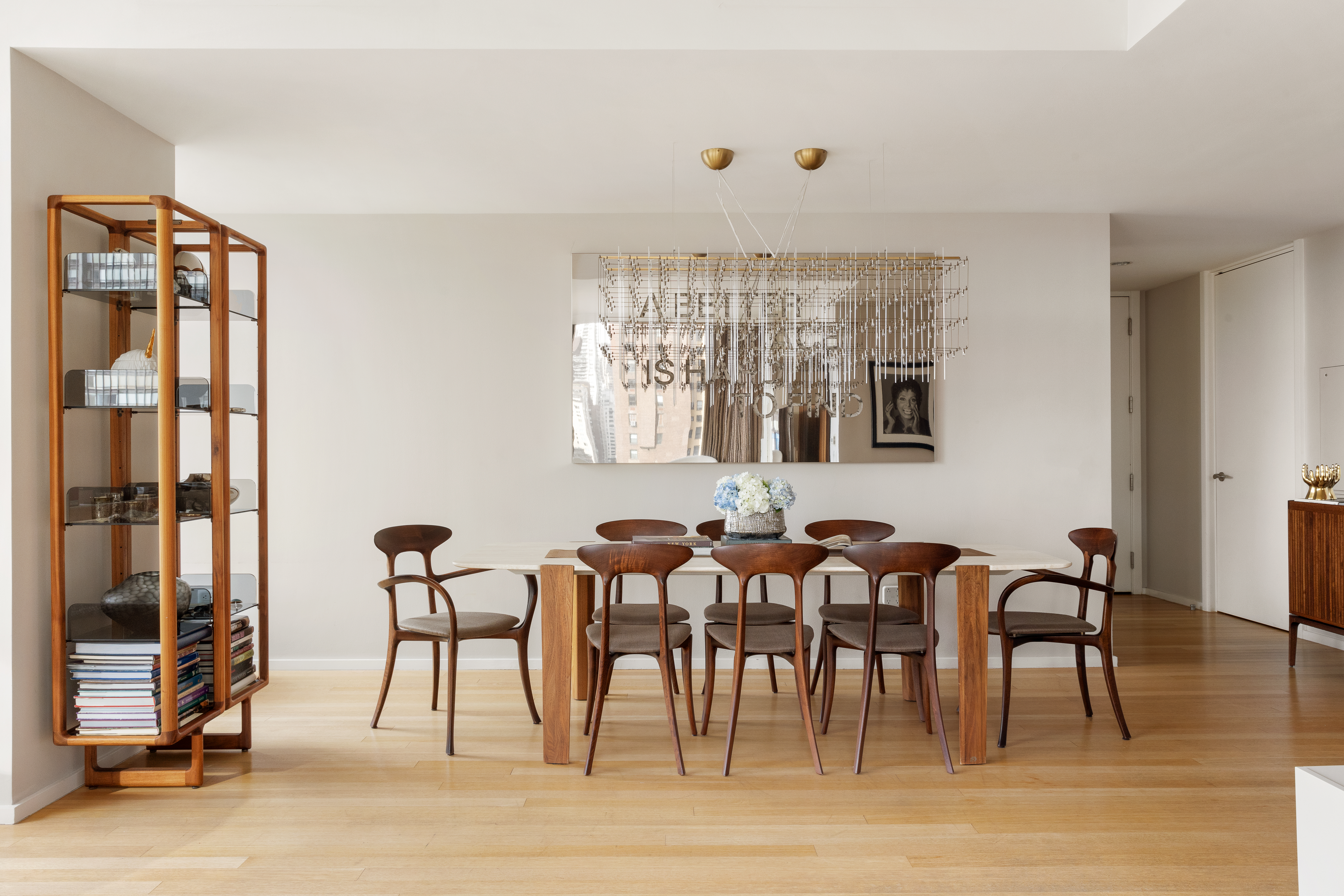 50 United Nations Plaza, Unit 6B Manhattan, NY 10017 - Photo 4 of 13 a view of a a dining room with furniture window and wooden floor