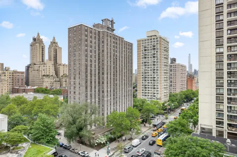 a view of a city with tall buildings in the background