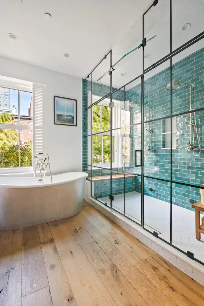 a bathroom with a bathtub and window
