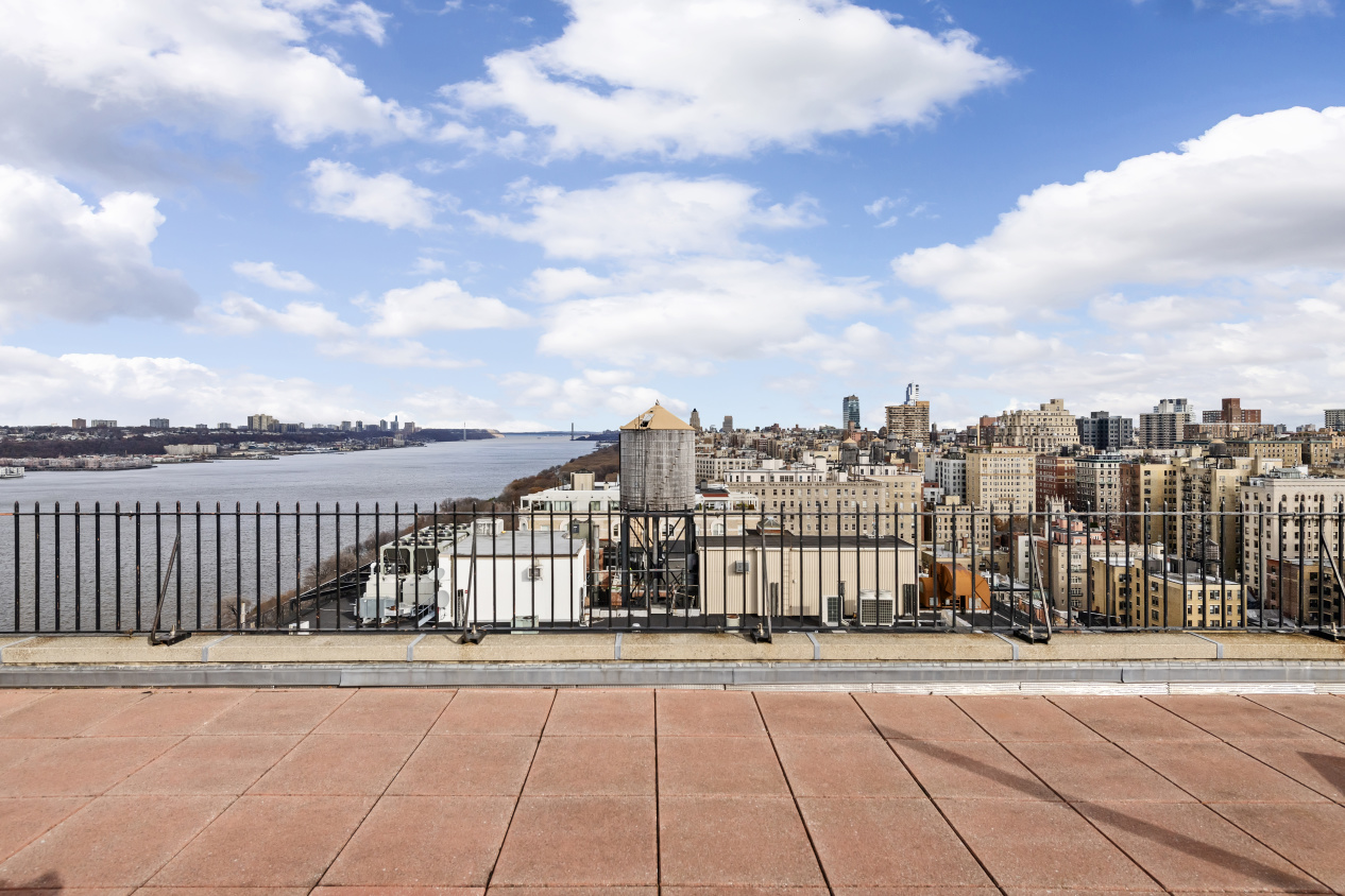 140 Riverside Drive, Unit 1G Manhattan, NY 10024 - Photo 14 of 16 a view of a terrace with city view