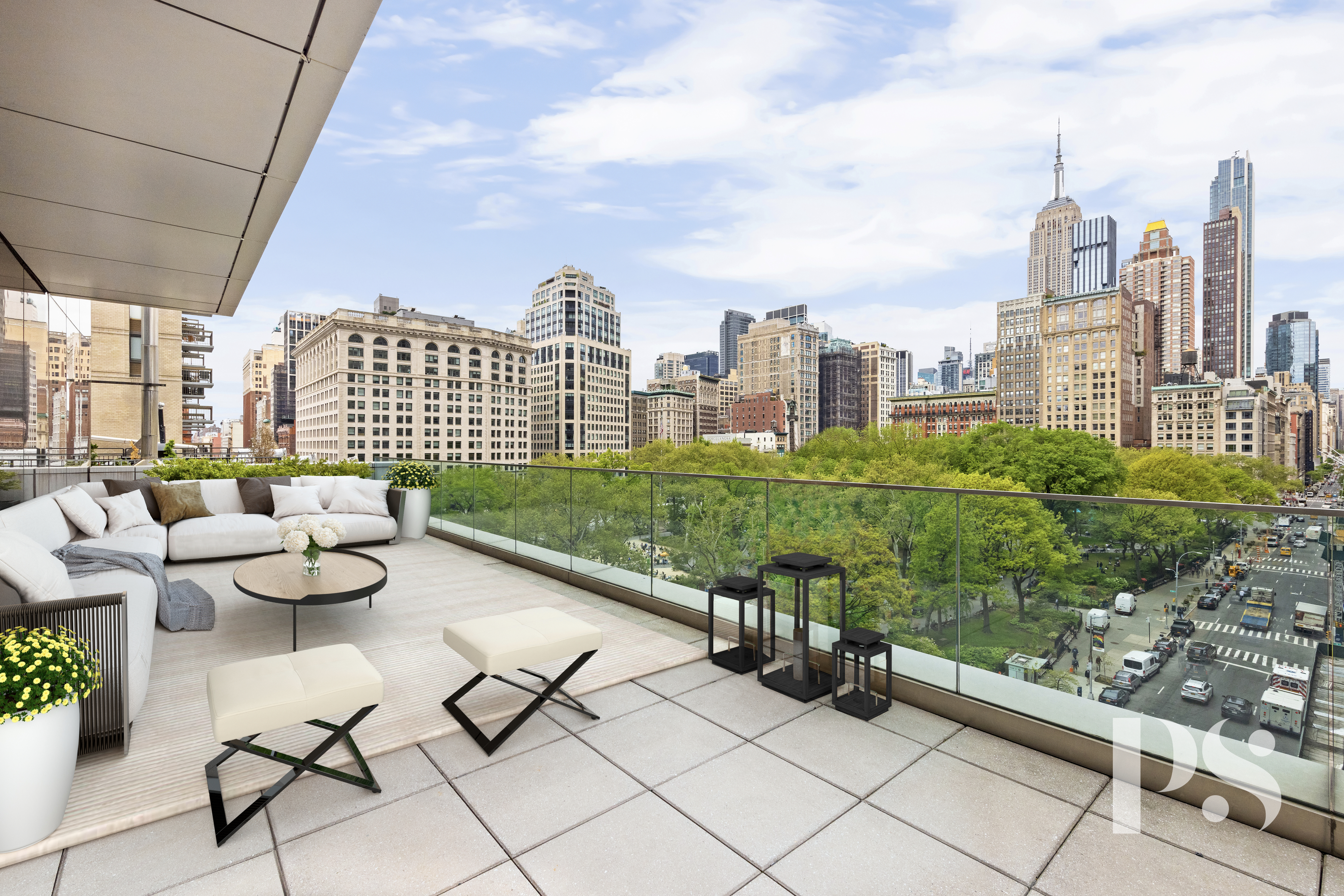 a view of terrace with lawn chairs and iron fence
