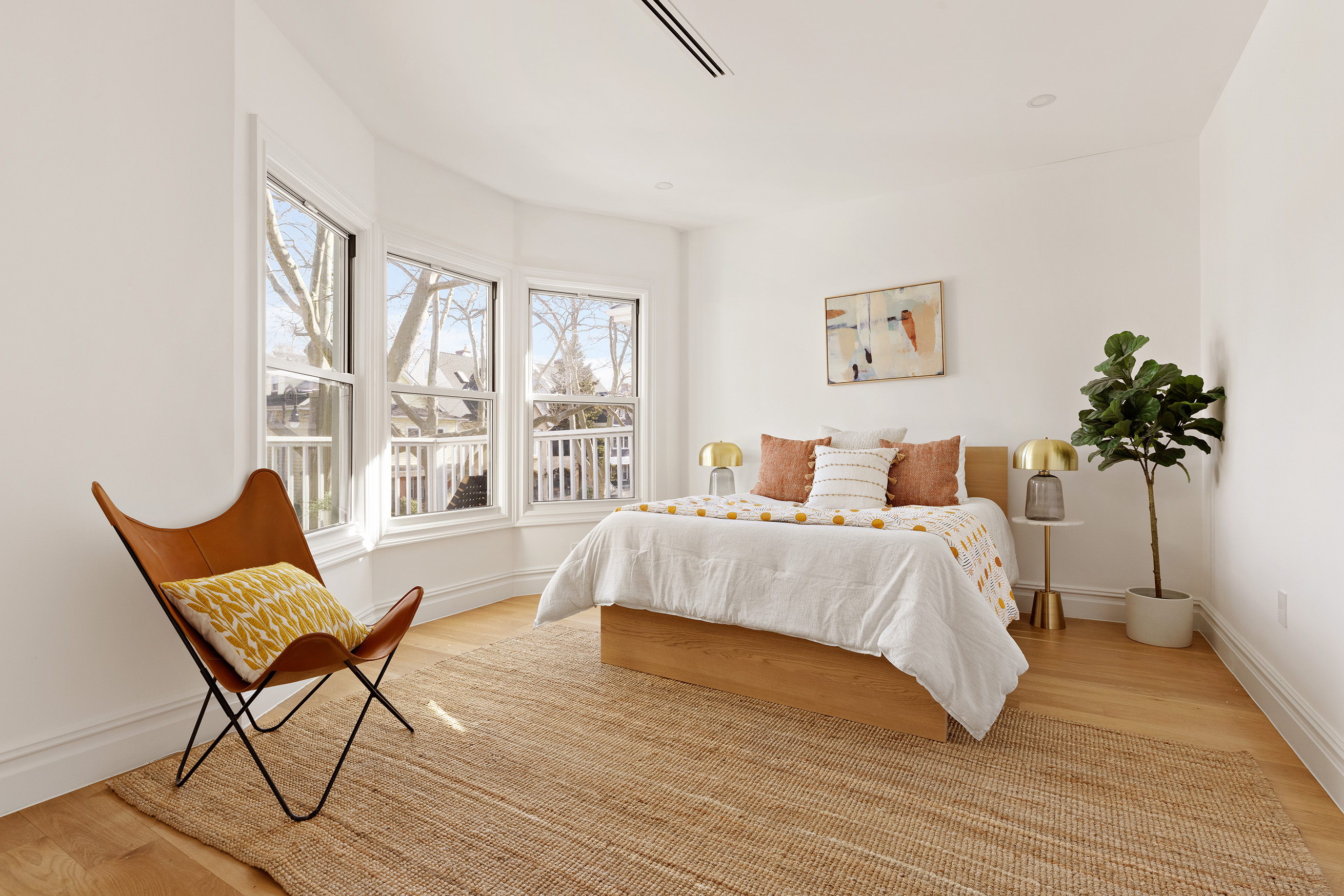 728 Westminster Road, Unit TWNHS Brooklyn, NY 11230 - Photo 14 of 23 a spacious bedroom with a bed and a large window