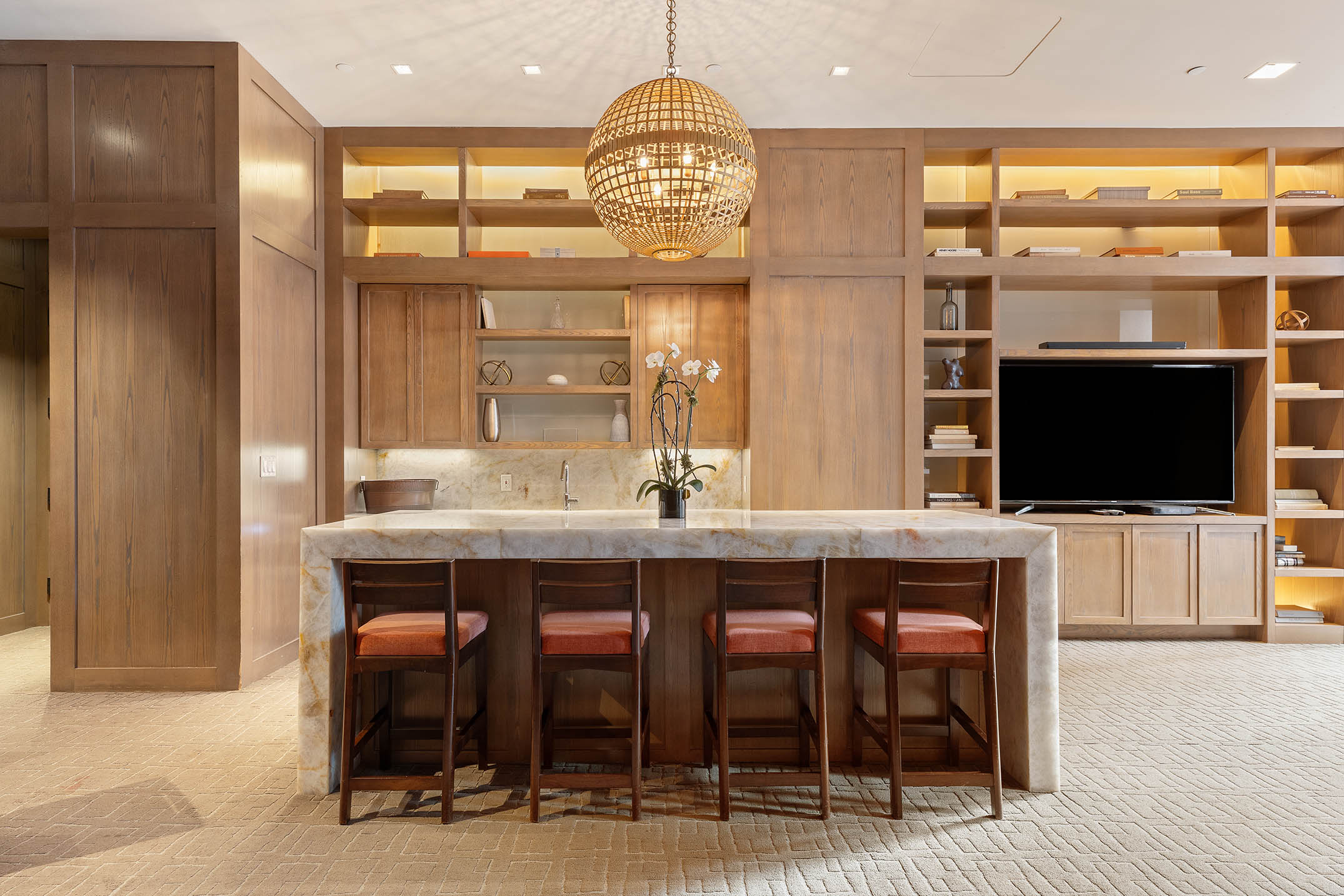 200 East 94th Street, Unit 1412 Manhattan, NY 10128 - Photo 8 of 15 a dining hall with a dining table chairs and a refrigerator