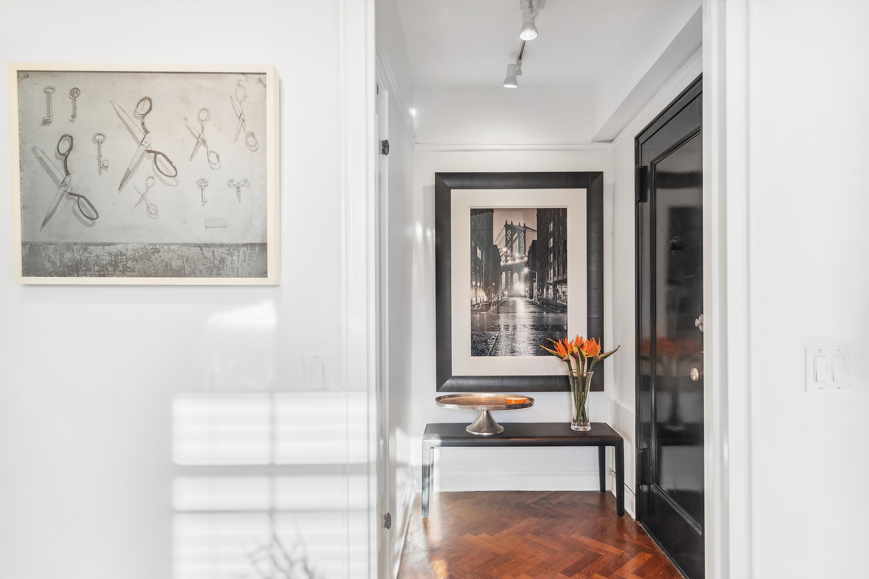 140 Cabrini Boulevard, Unit 92 Manhattan, NY 10033 - Photo 6 of 22 a hallway with a white door and couch