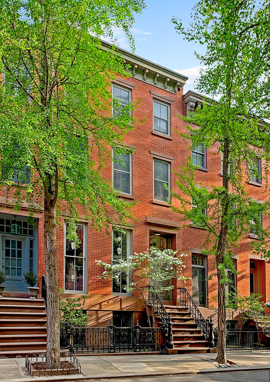 25 Perry Street Manhattan, NY 10014 - Photo 2 of 32 a front view of a multi story residential apartment buildings