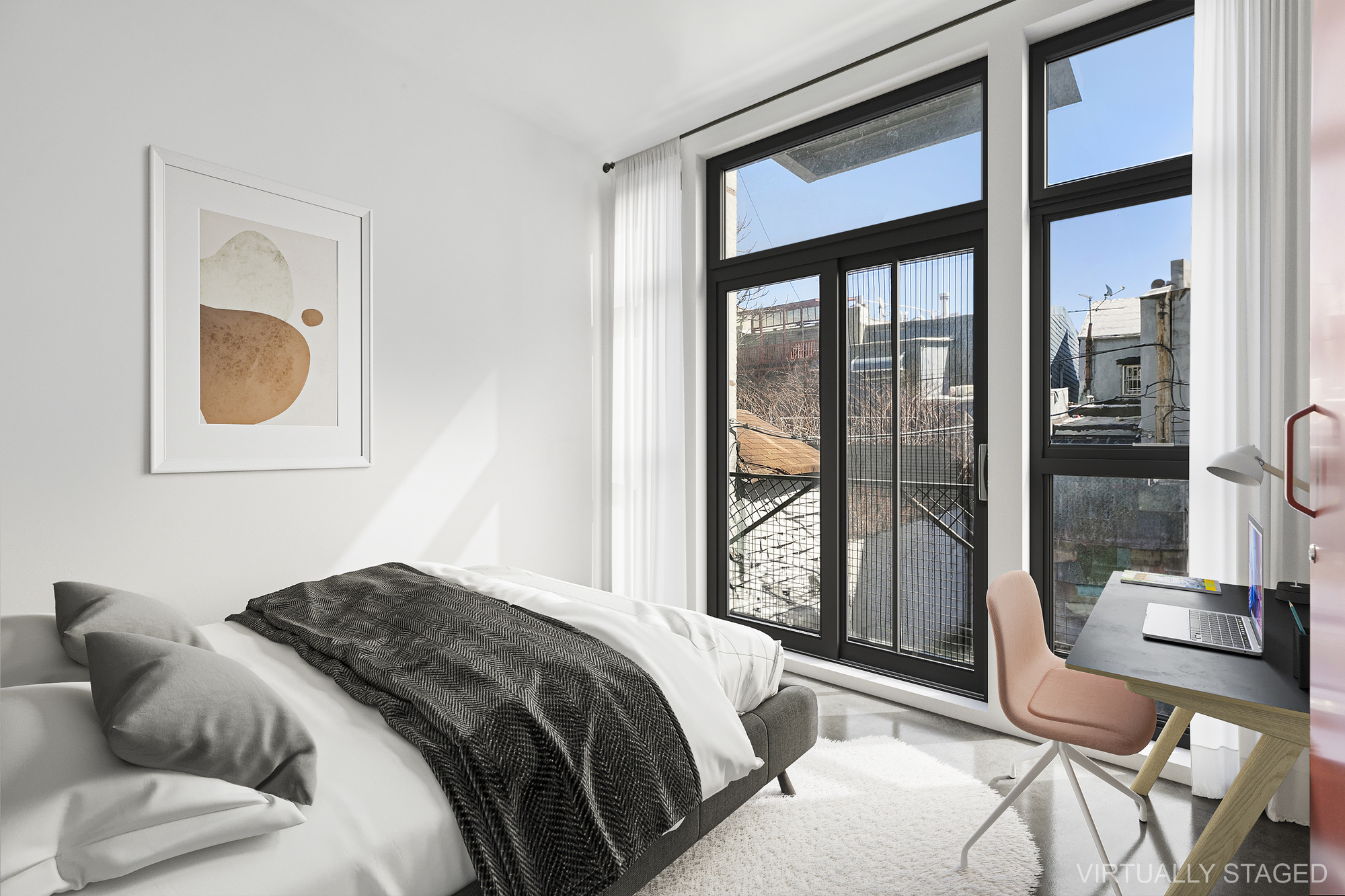 30 Belvidere Street, Unit 2B Brooklyn, NY 11206 - Photo 5 of 7 a bedroom with a bed and glass windows