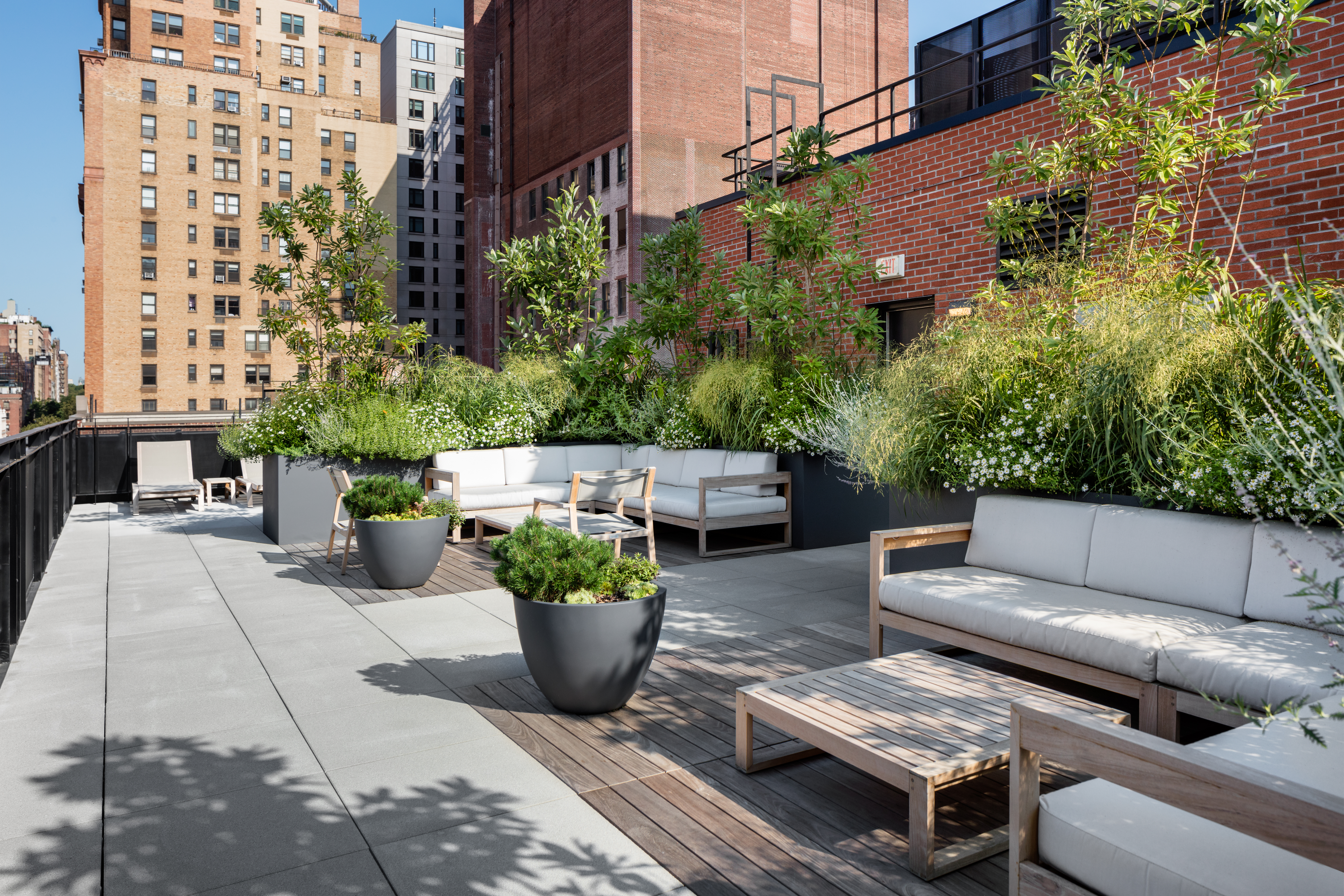 245 East 78th Street, Unit 5A Manhattan, NY 10075 - Photo 12 of 14 a view of a patio with couches and potted plants