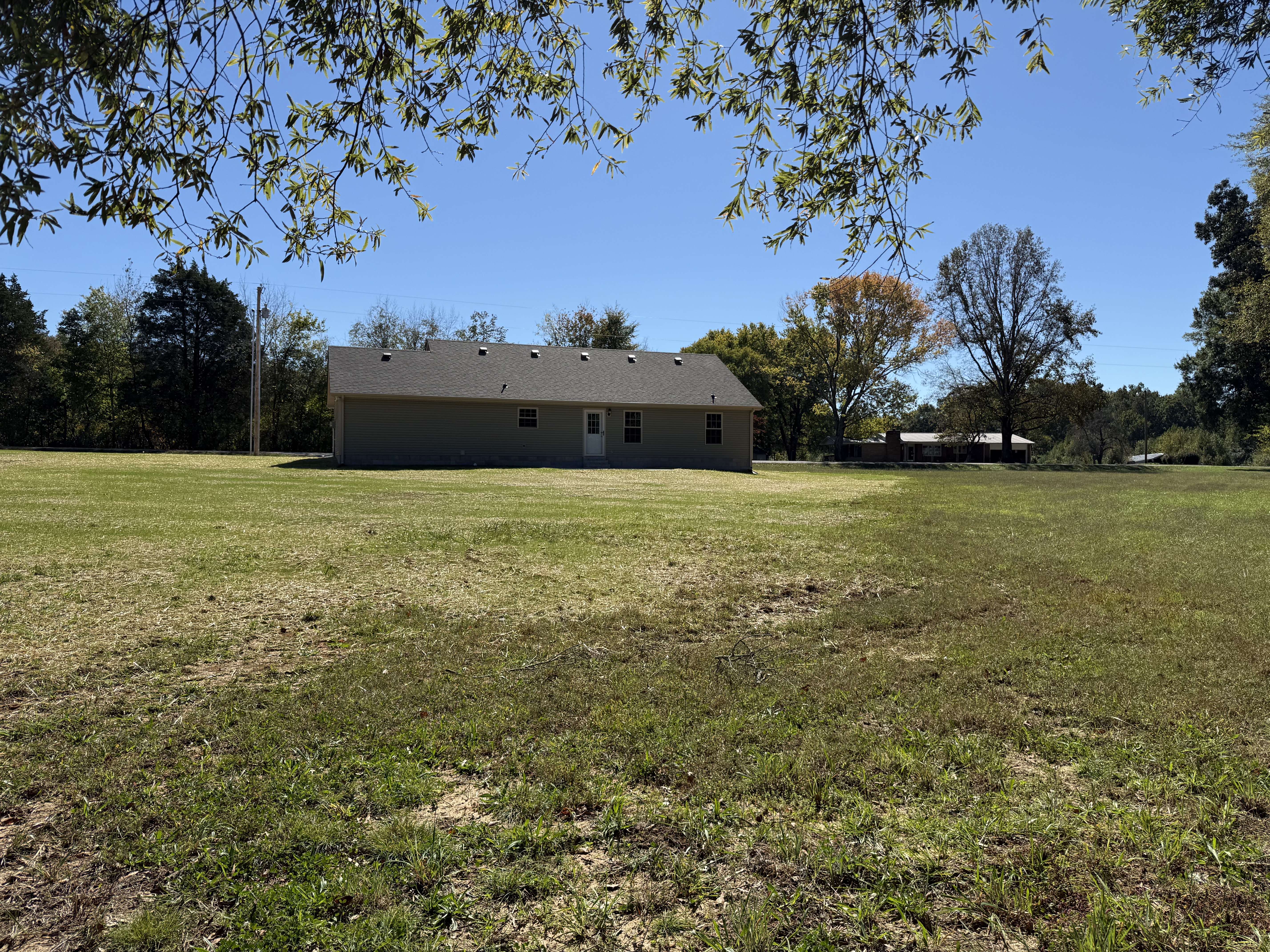 517 Paynes Church Road Estill Springs, TN 37330 - Photo 31 of 32 a view of a big yard with plants and large trees