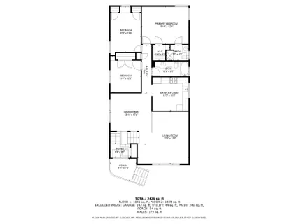 a picture of a bench in front of a white house