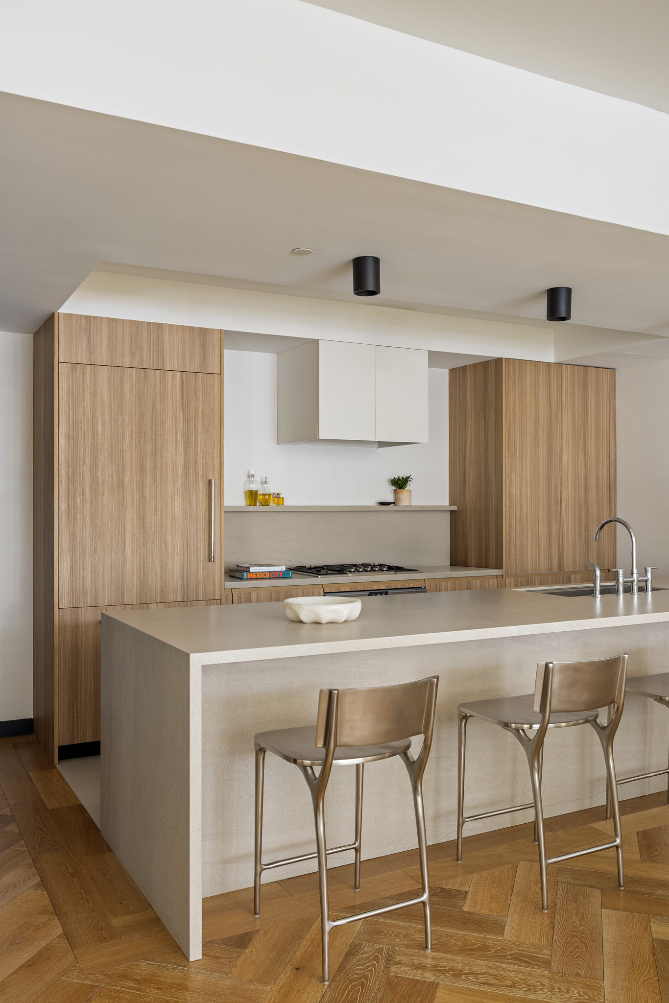 51 Jay Street, Unit 2A Brooklyn, NY 11201 - Photo 2 of 15 a kitchen with stainless steel appliances a table and chairs in it