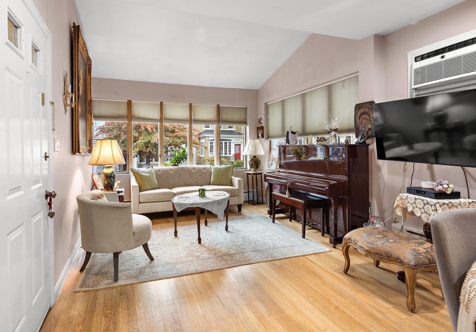 558 84th Street Brooklyn, NY 11209 - Photo 5 of 25 a living room with furniture and a flat screen tv