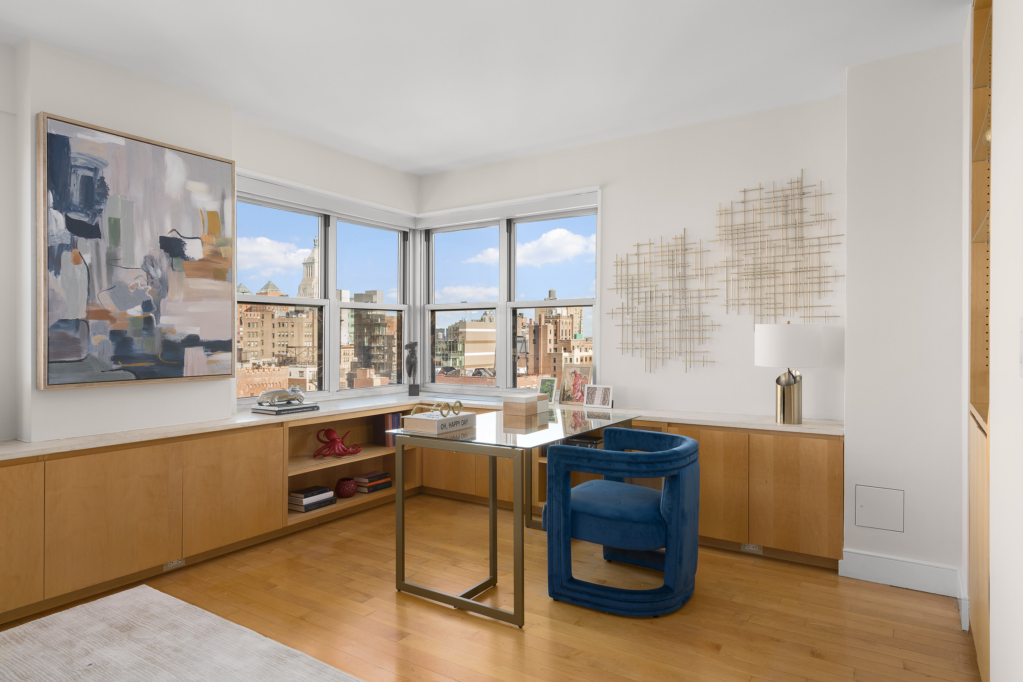 20 East 9th Street, Unit 22C Manhattan, NY 10003 - Photo 2 of 21 a view of a workspace with furniture and a window