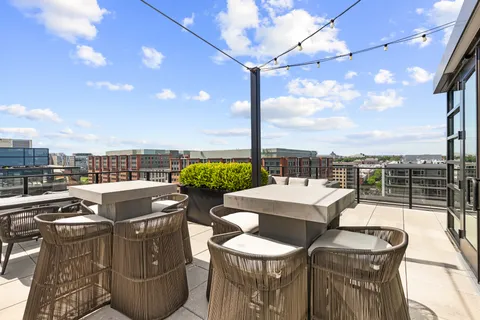 a view of a terrace with furniture and a terrace view