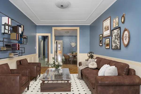 a living room with furniture and a rug